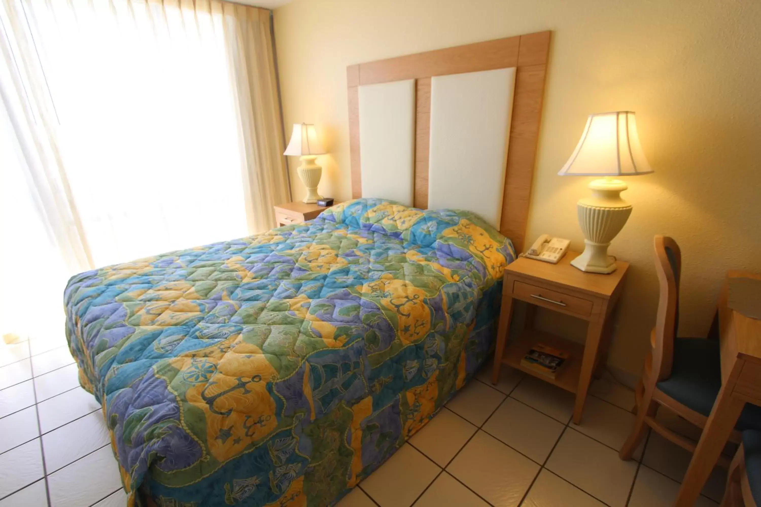 Bed, Room Photo in Royale Beach and Tennis Club, a VRI resort