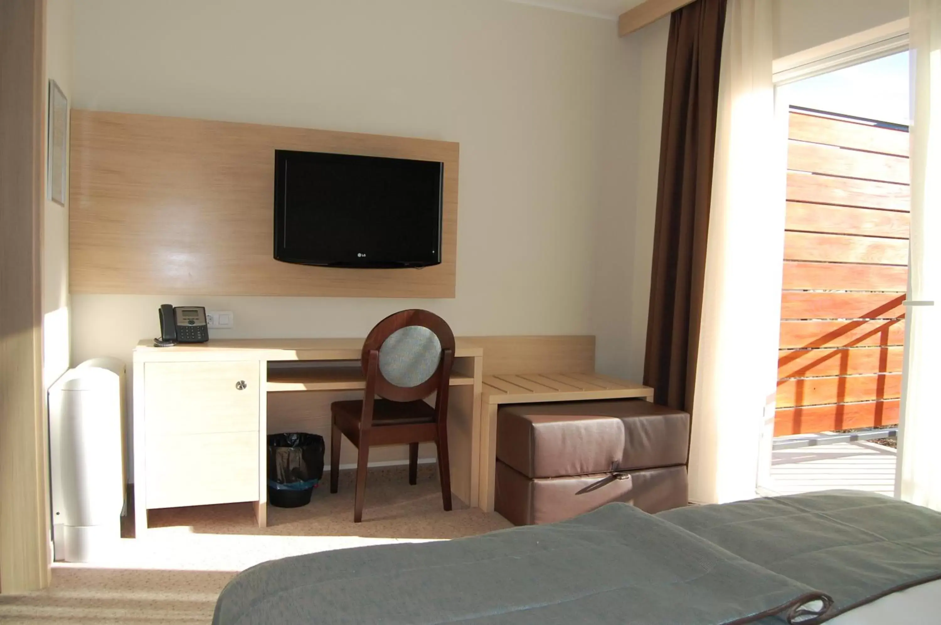 TV and multimedia, TV/Entertainment Center in Hotel Mangart