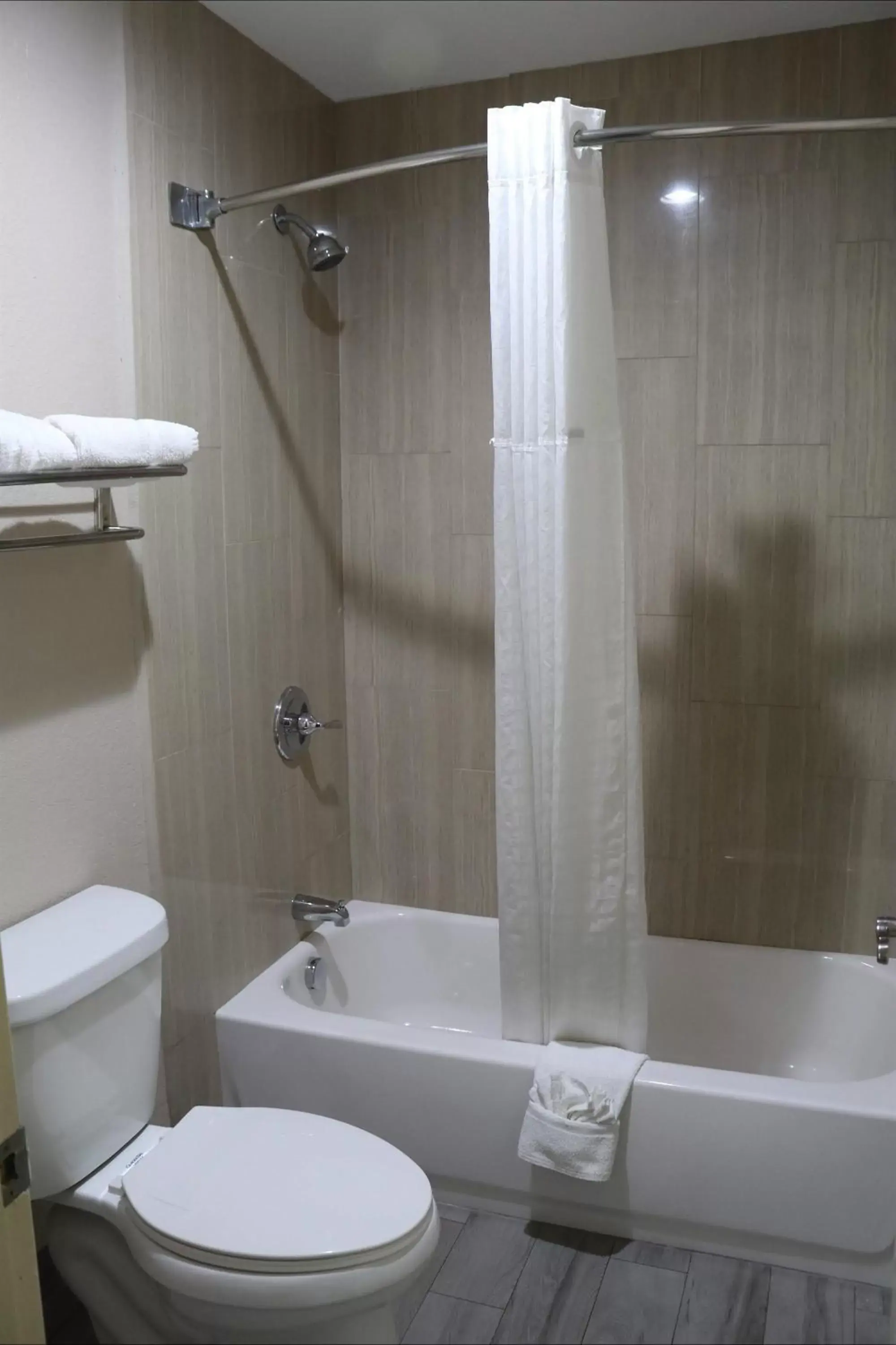 Bathroom in SureStay Hotel by Best Western Terrell