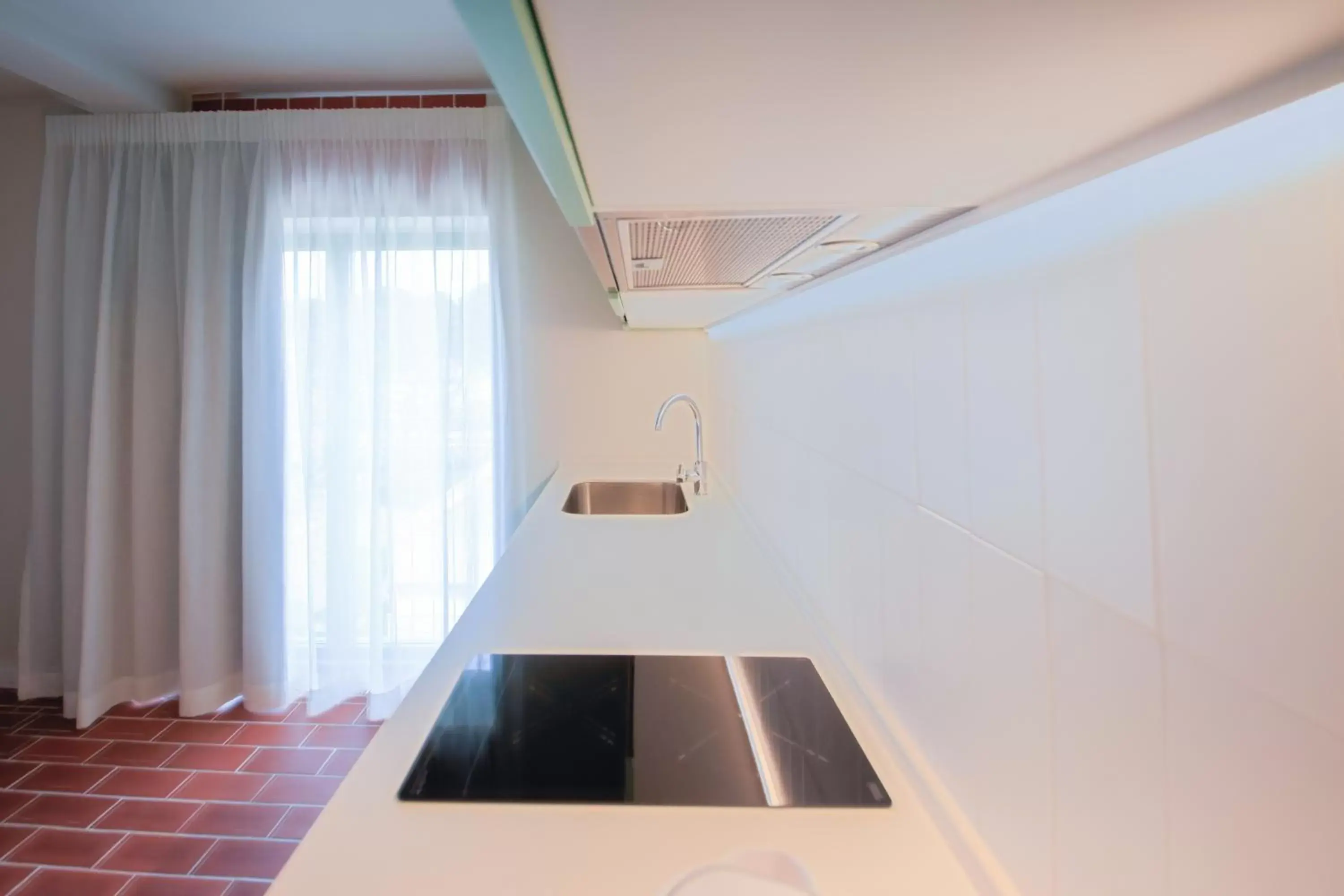 Kitchen or kitchenette in Terra Aurea Aparthotel