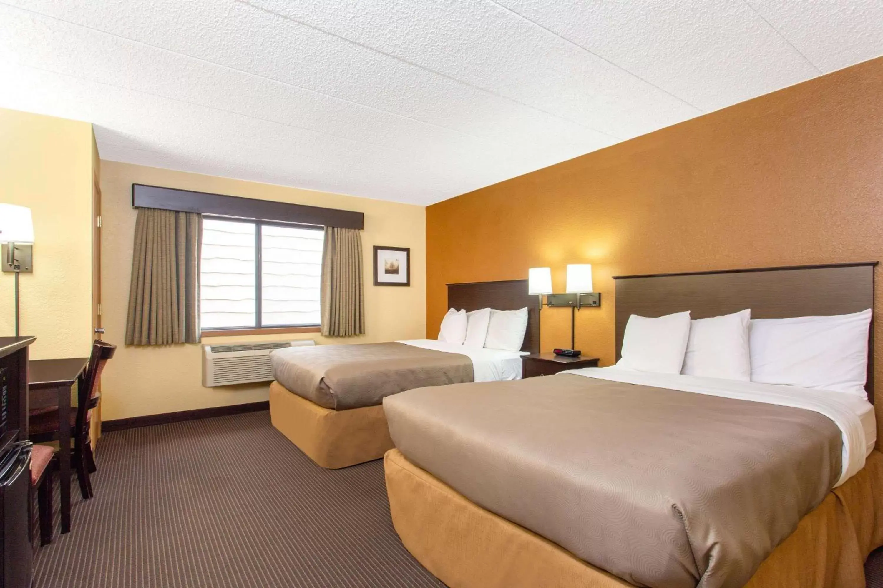 Photo of the whole room in AmericInn by Wyndham West Bend