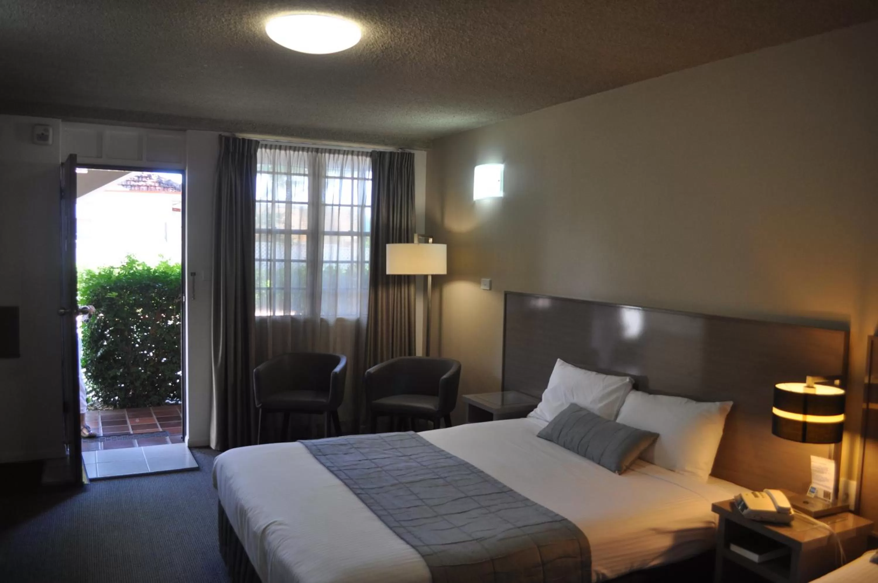 Bed in In Town Motor Inn