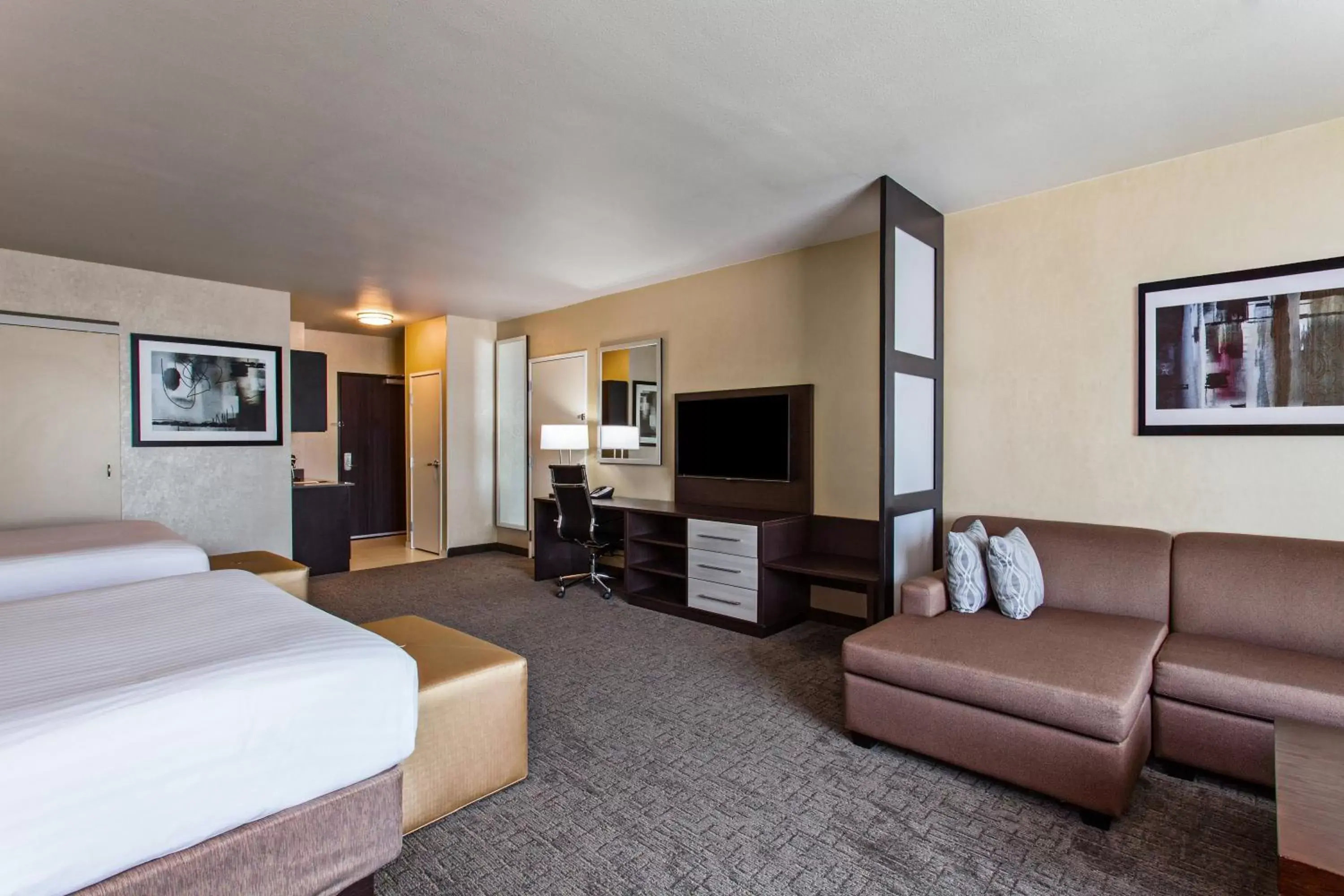 Photo of the whole room, TV/Entertainment Center in Holiday Inn Express & Suites Anaheim Resort Area, an IHG Hotel