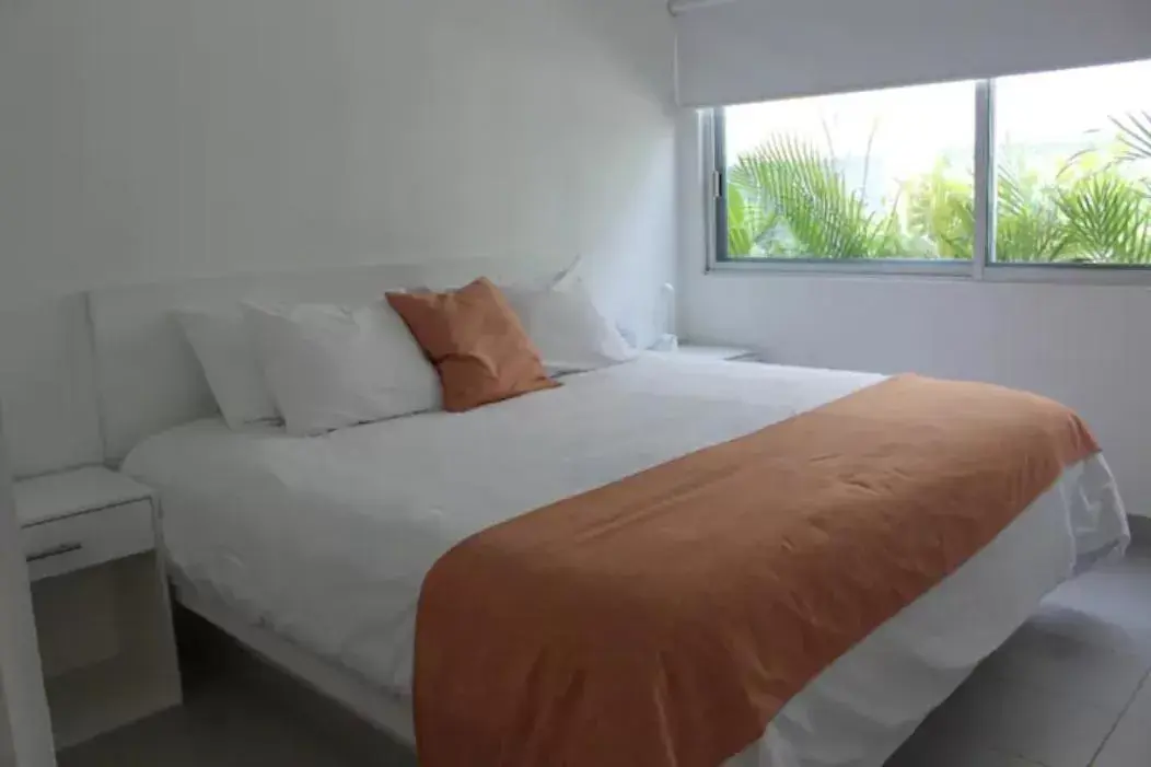 Bed in Papaya Condo Acapulco Diamante -Solo Adultos