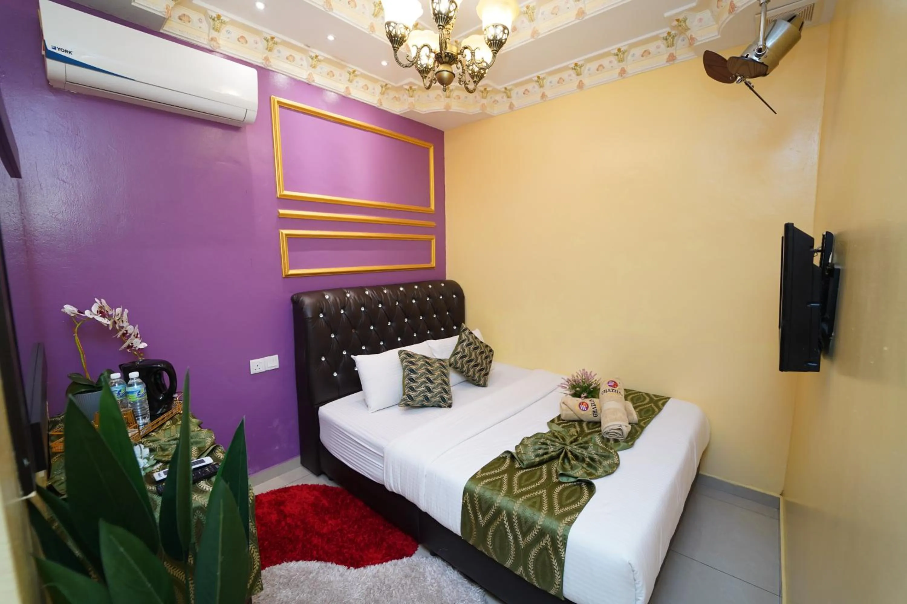 Bed in Ghazrin's Classic Hotel JB