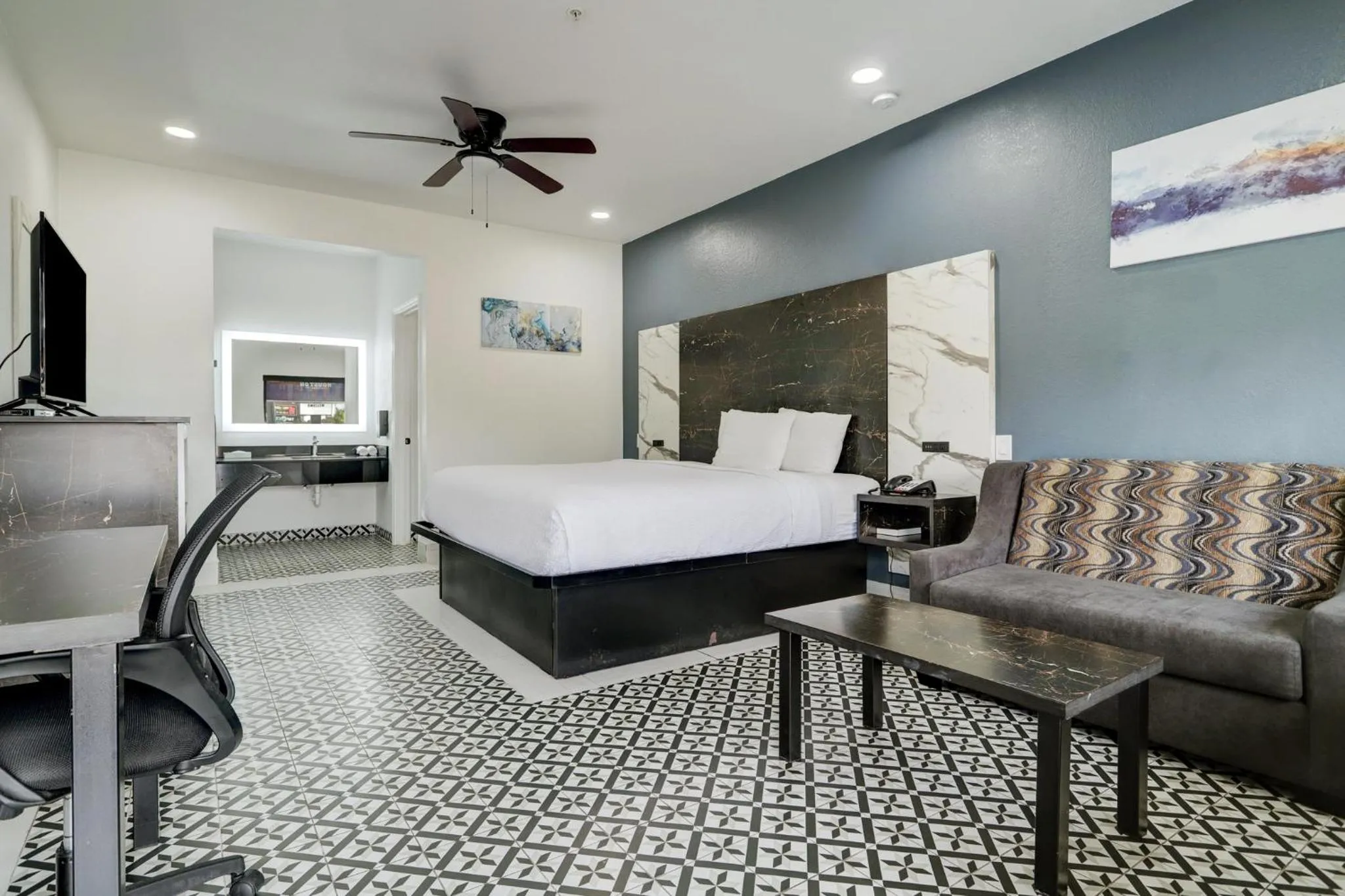 Bedroom in Grand Villa Inn Galleria