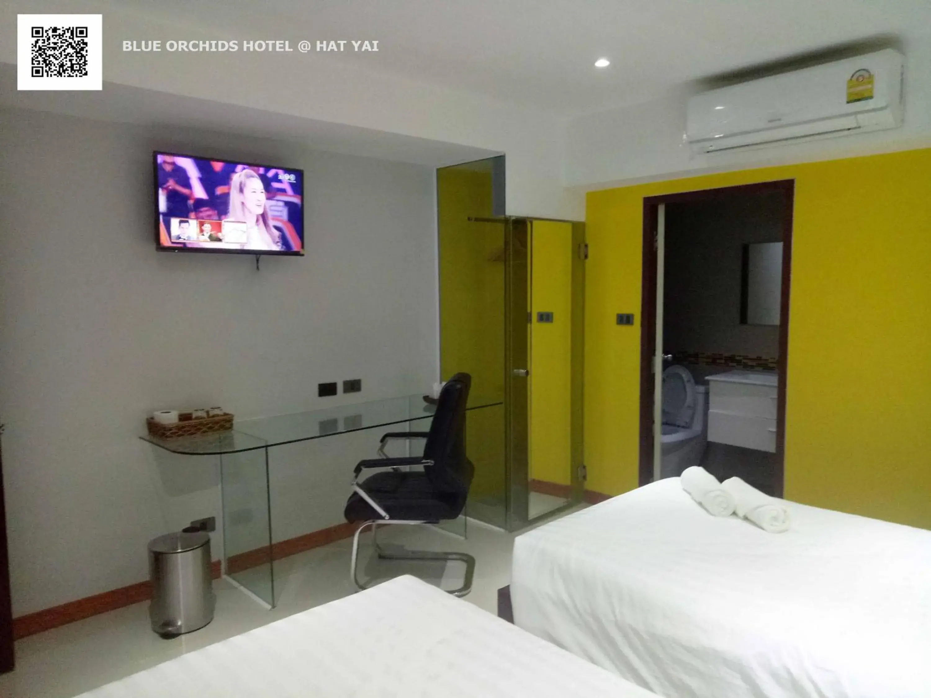 TV and multimedia, TV/Entertainment Center in Blue Orchids Hotel