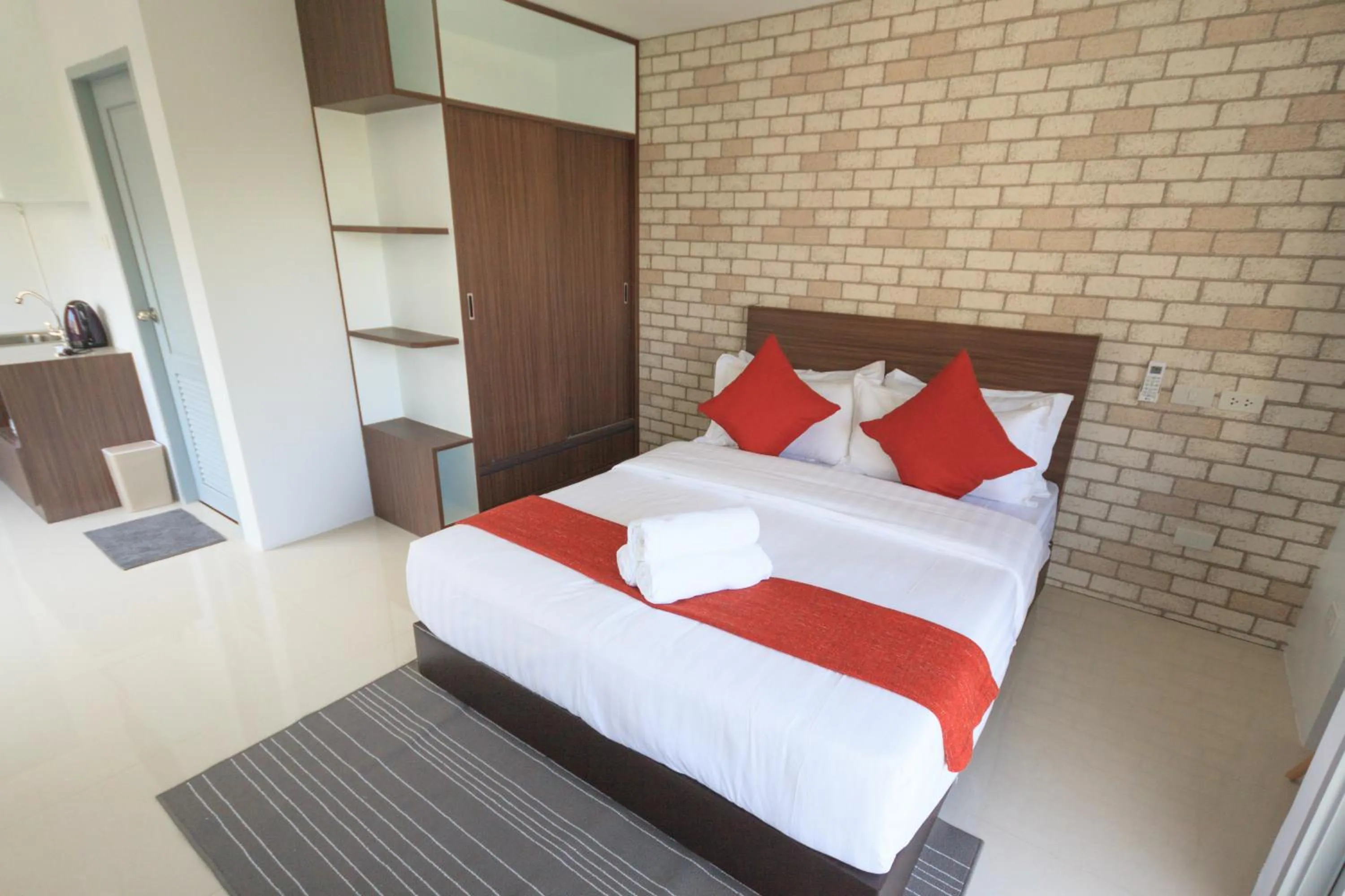 Bed in Q Space Residence