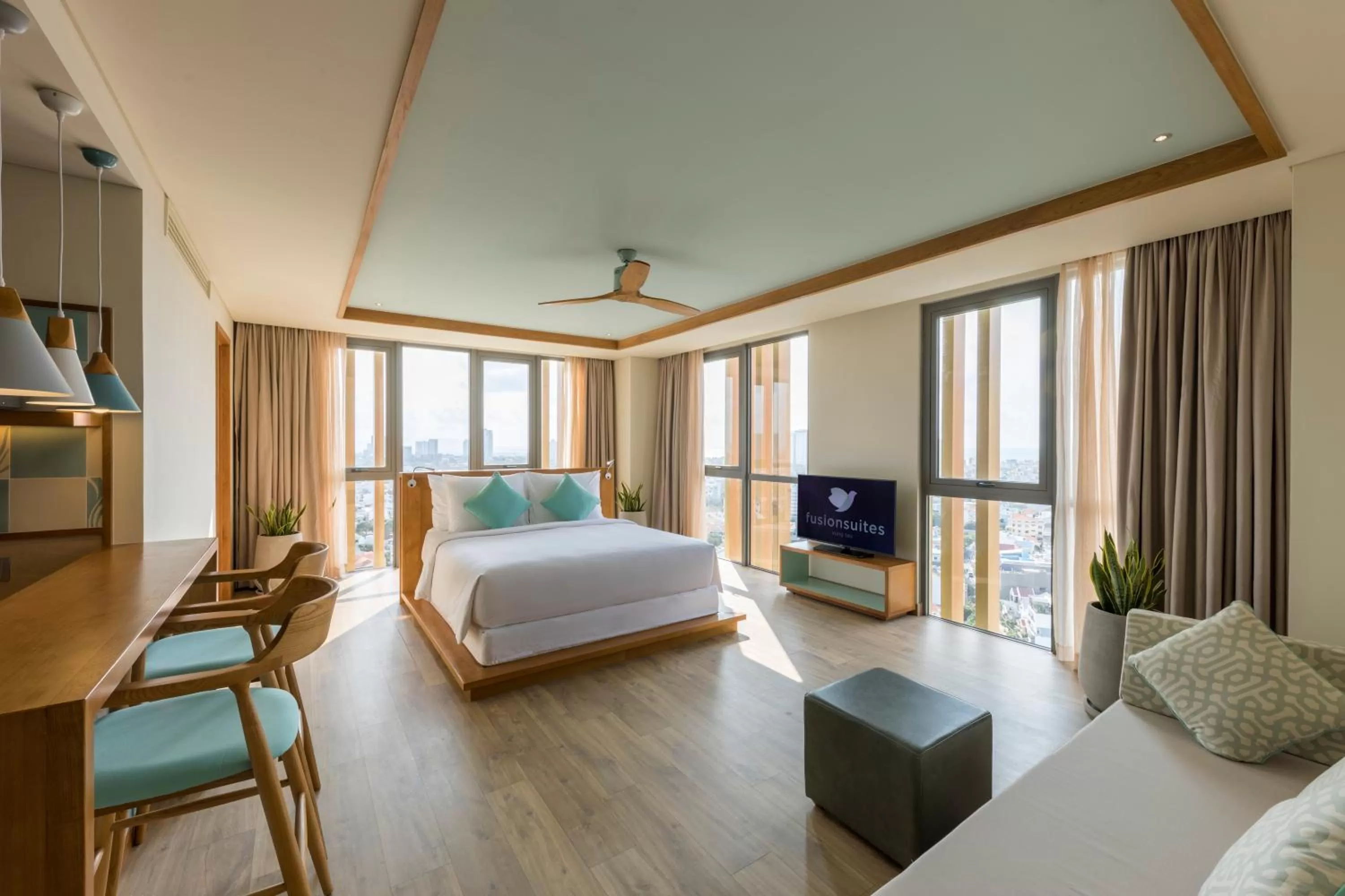 Living room, Bed in Fusion Suites Vung Tau