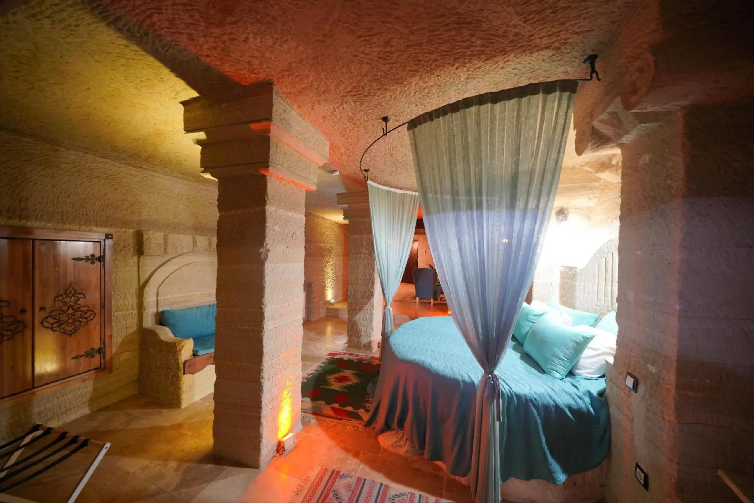 Bed in Holiday Cave Hotel