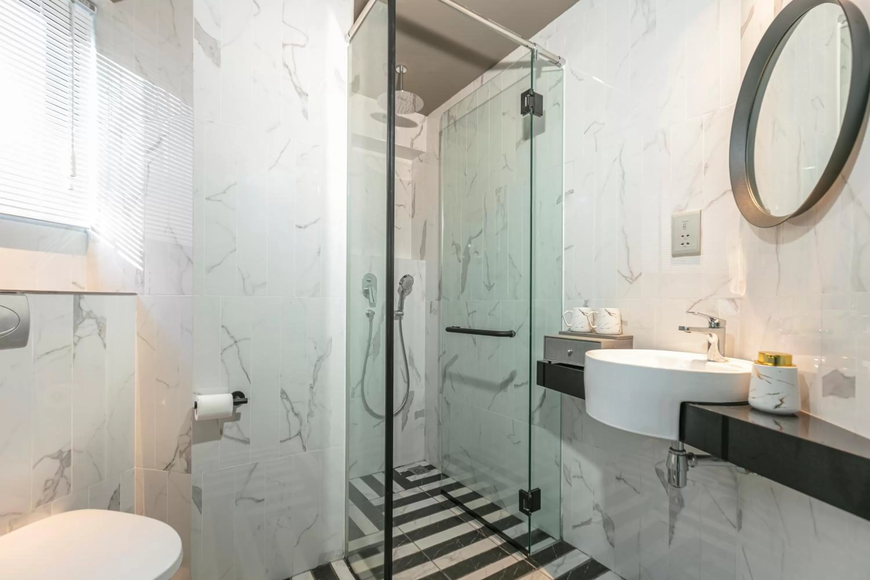 Bathroom in Hotel Calmo Bugis