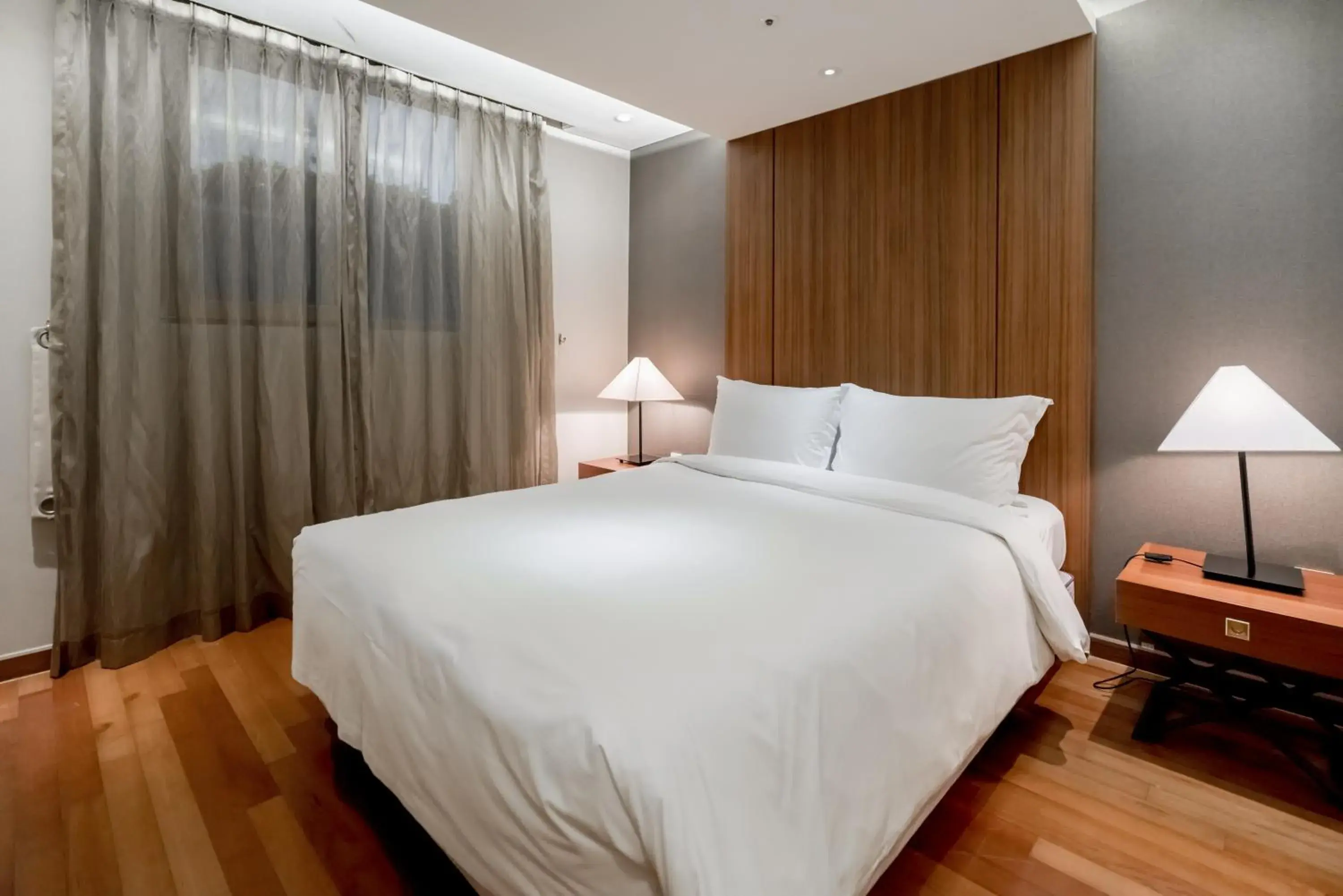 Bed in Oriens Hotel & Residences Myeongdong