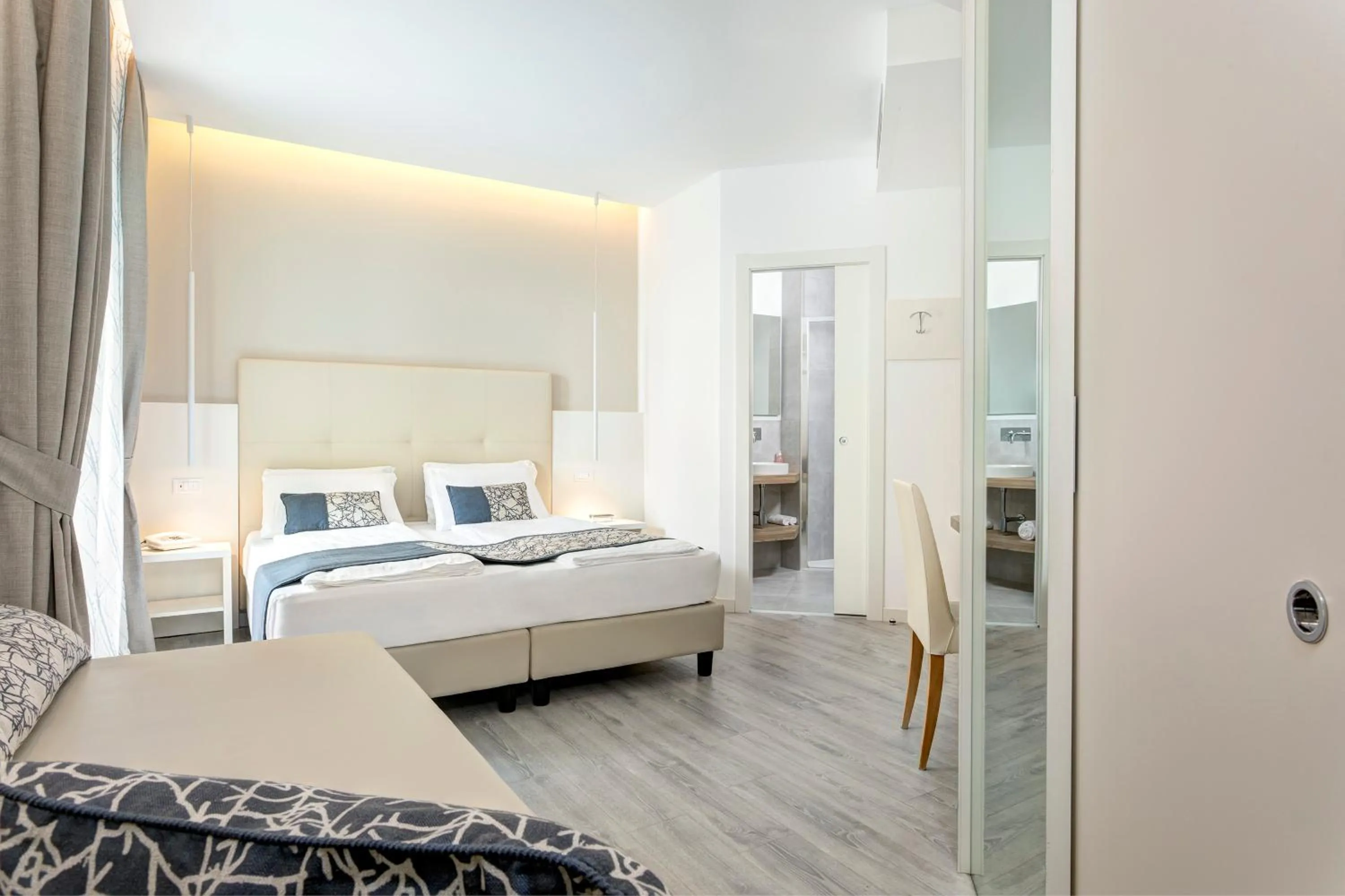 Bed in Hotel Cavalieri Palace & Suites