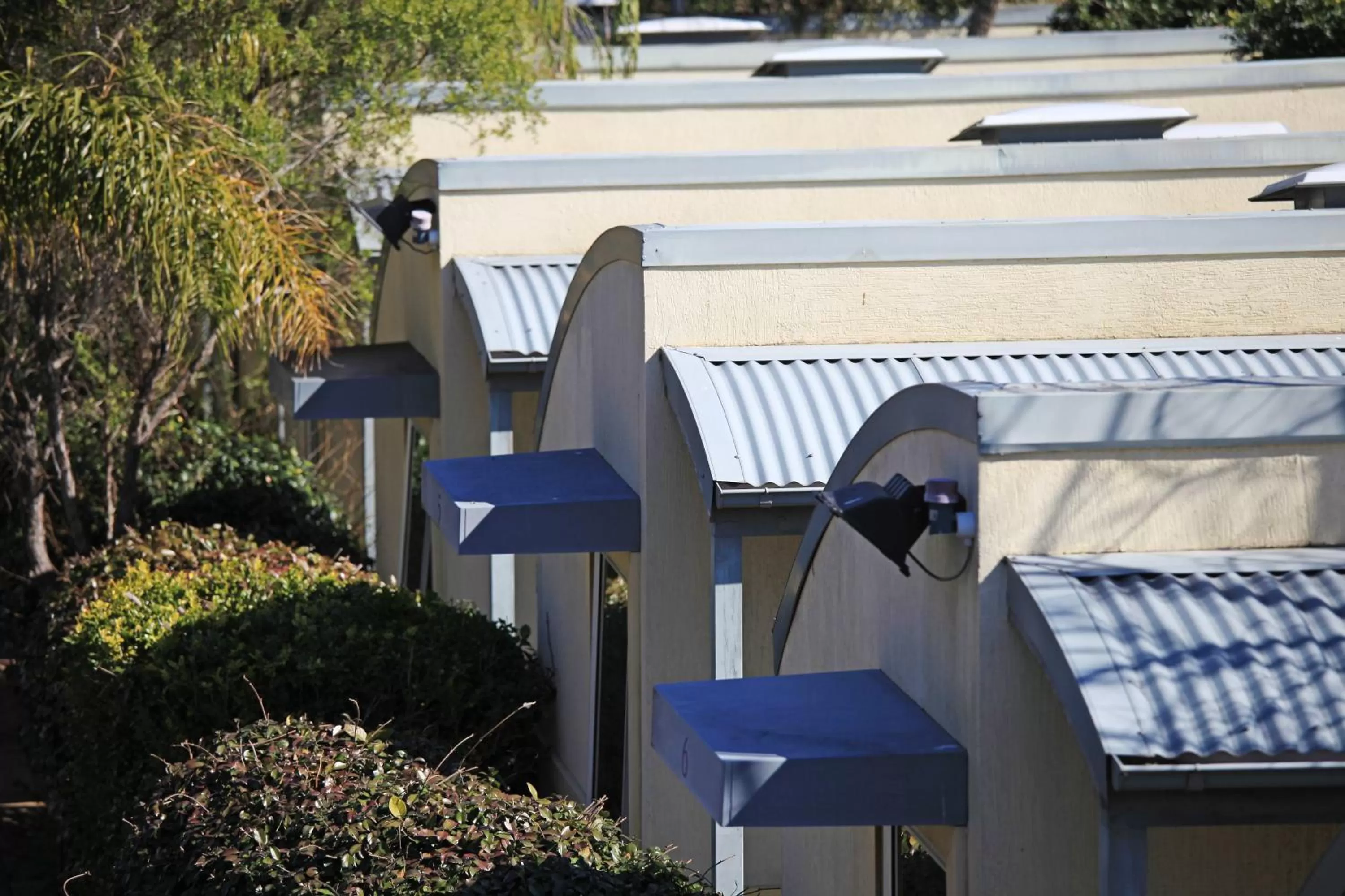 Property building in Travellers Motor Village