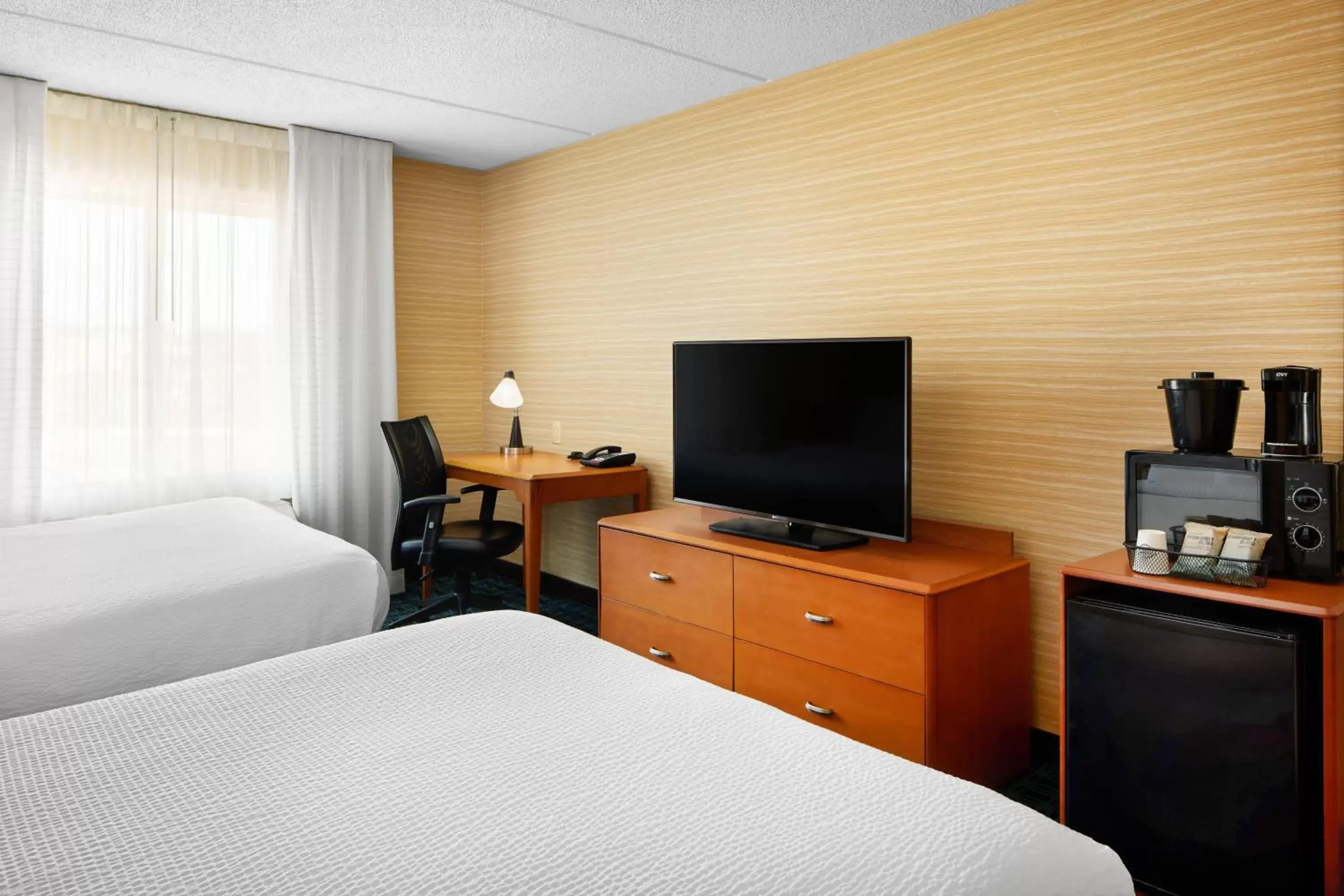 Photo of the whole room, TV/Entertainment Center in Fairfield Inn and Suites by Marriott Plainville