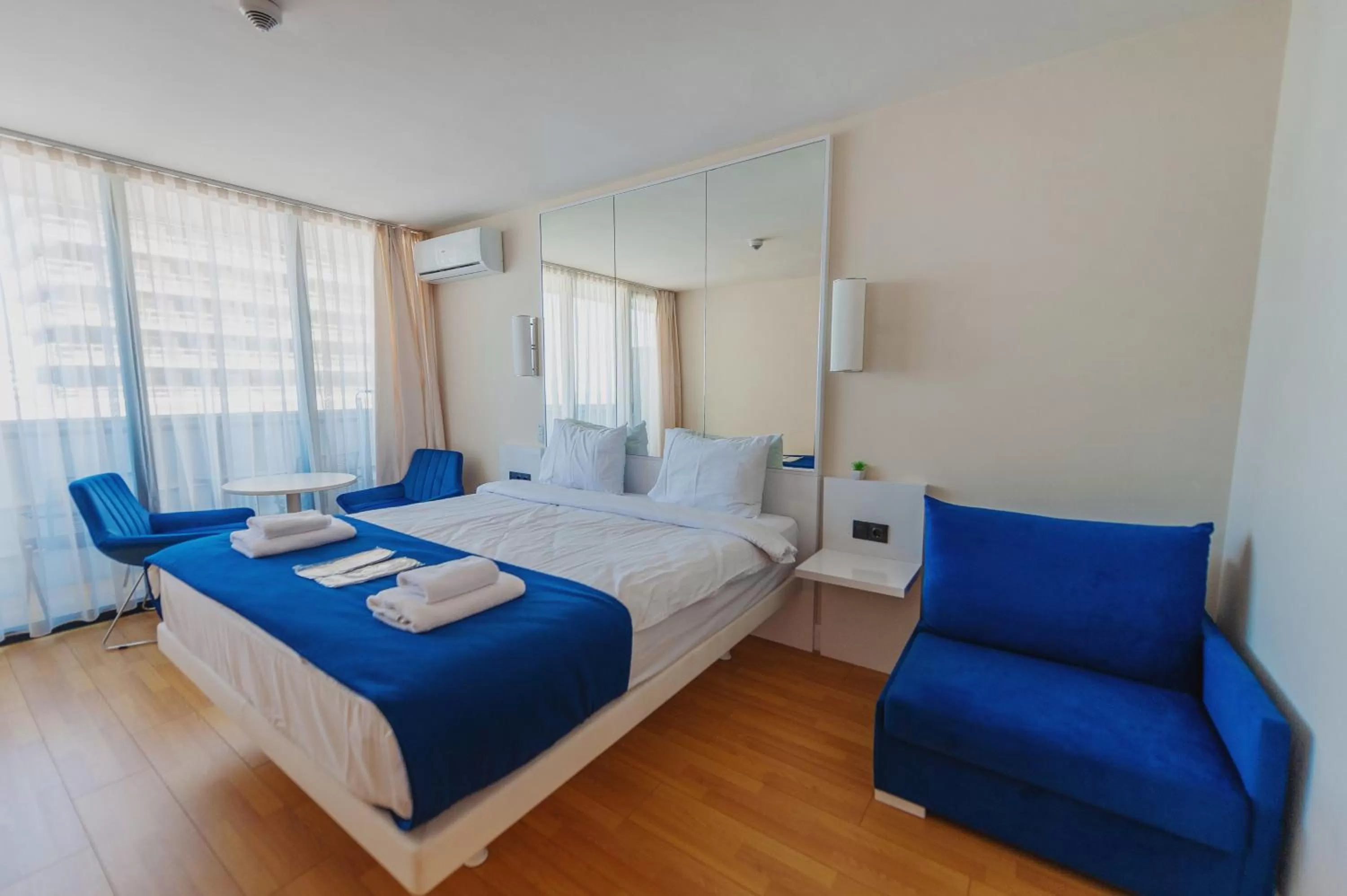 Bed in Orbi City Luxury Suite