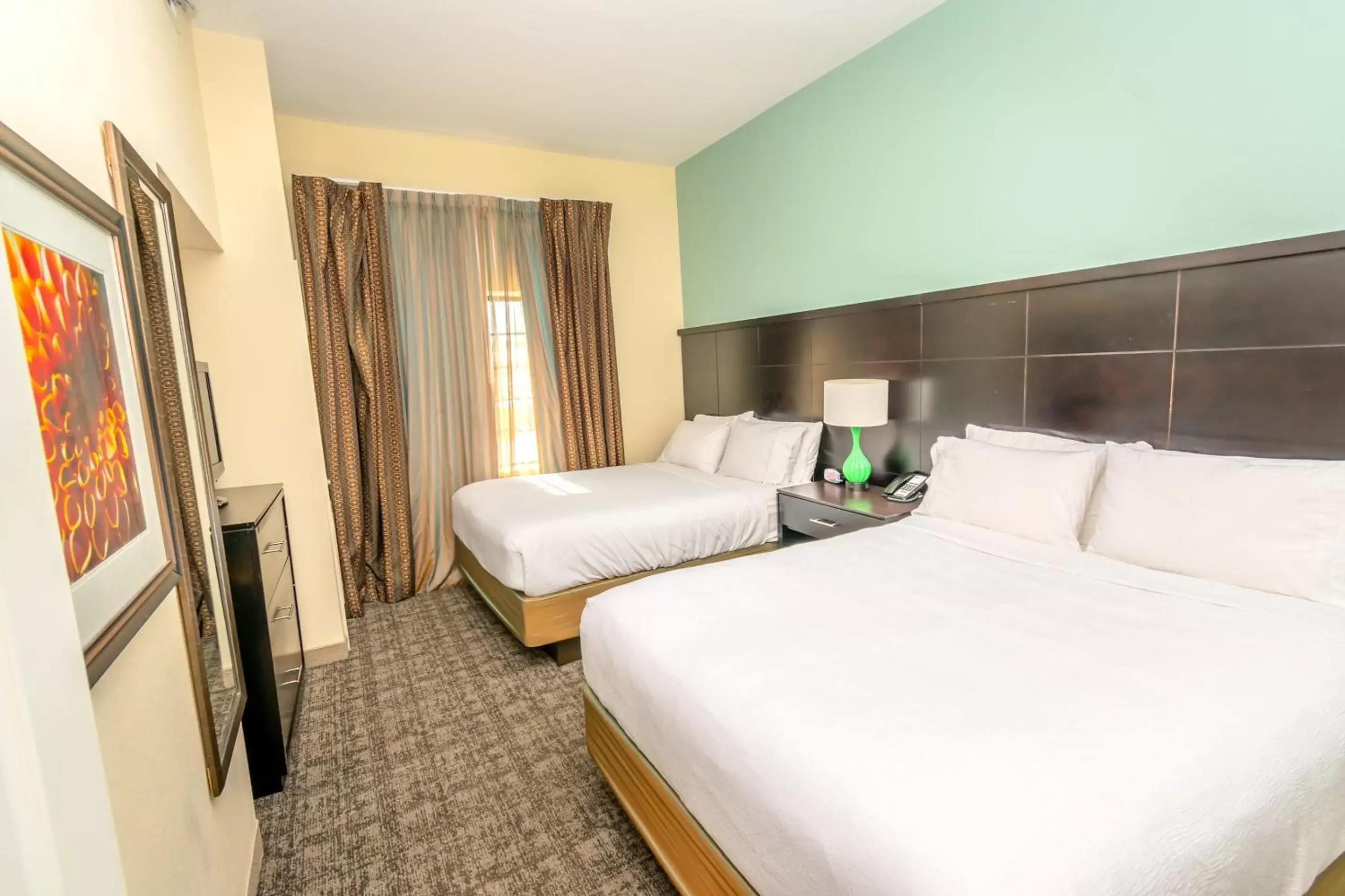 Bed in Staybridge Suites Houston - IAH Airport, an IHG Hotel