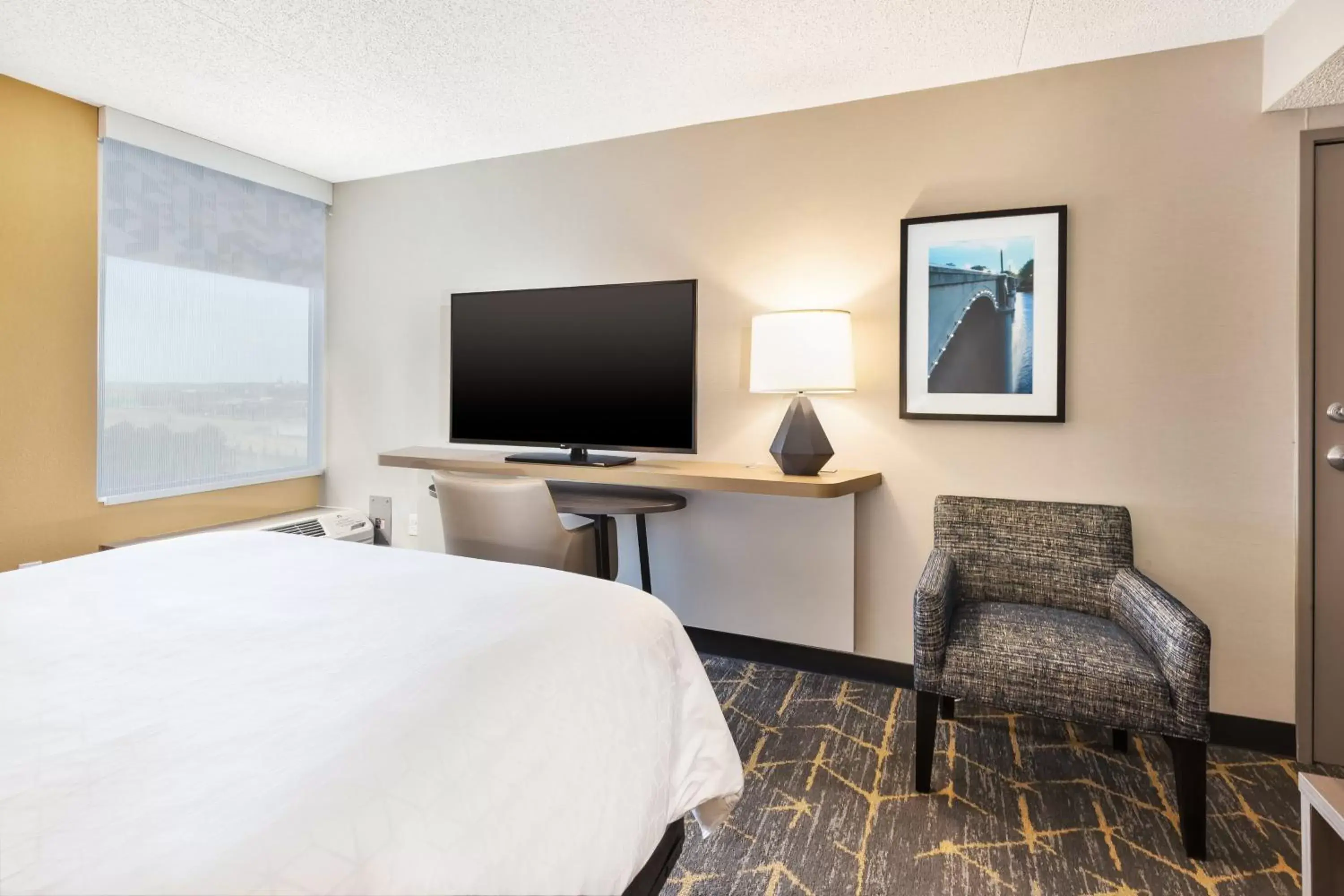 Photo of the whole room, TV/Entertainment Center in Holiday Inn Grand Rapids Downtown, an IHG Hotel