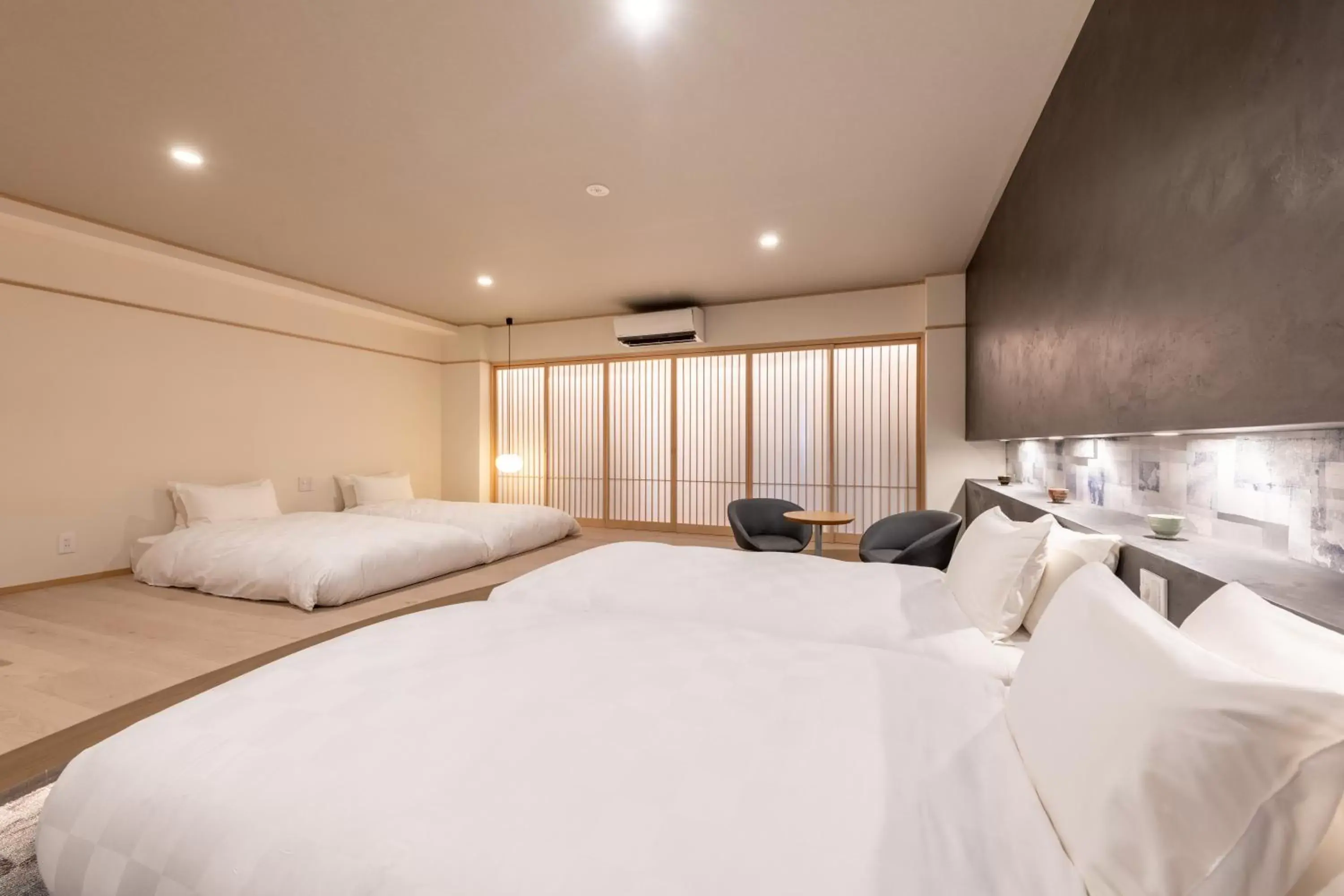 Bed in Wayfarer Kyoto Shijo