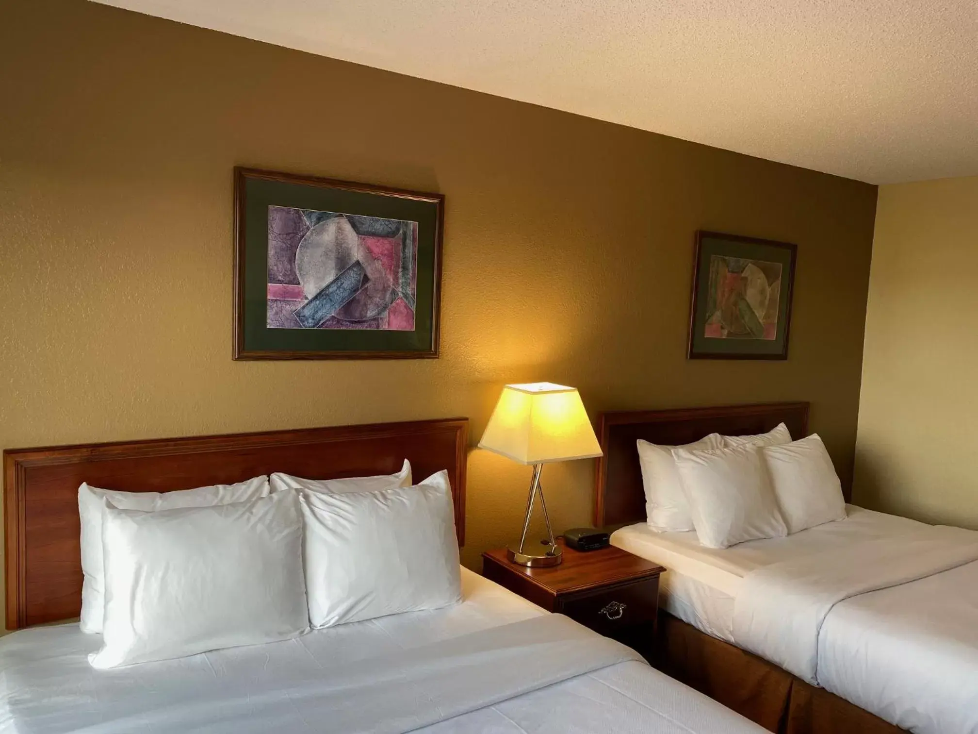 Bed in Comfort Inn & Suites at I-74 and 155