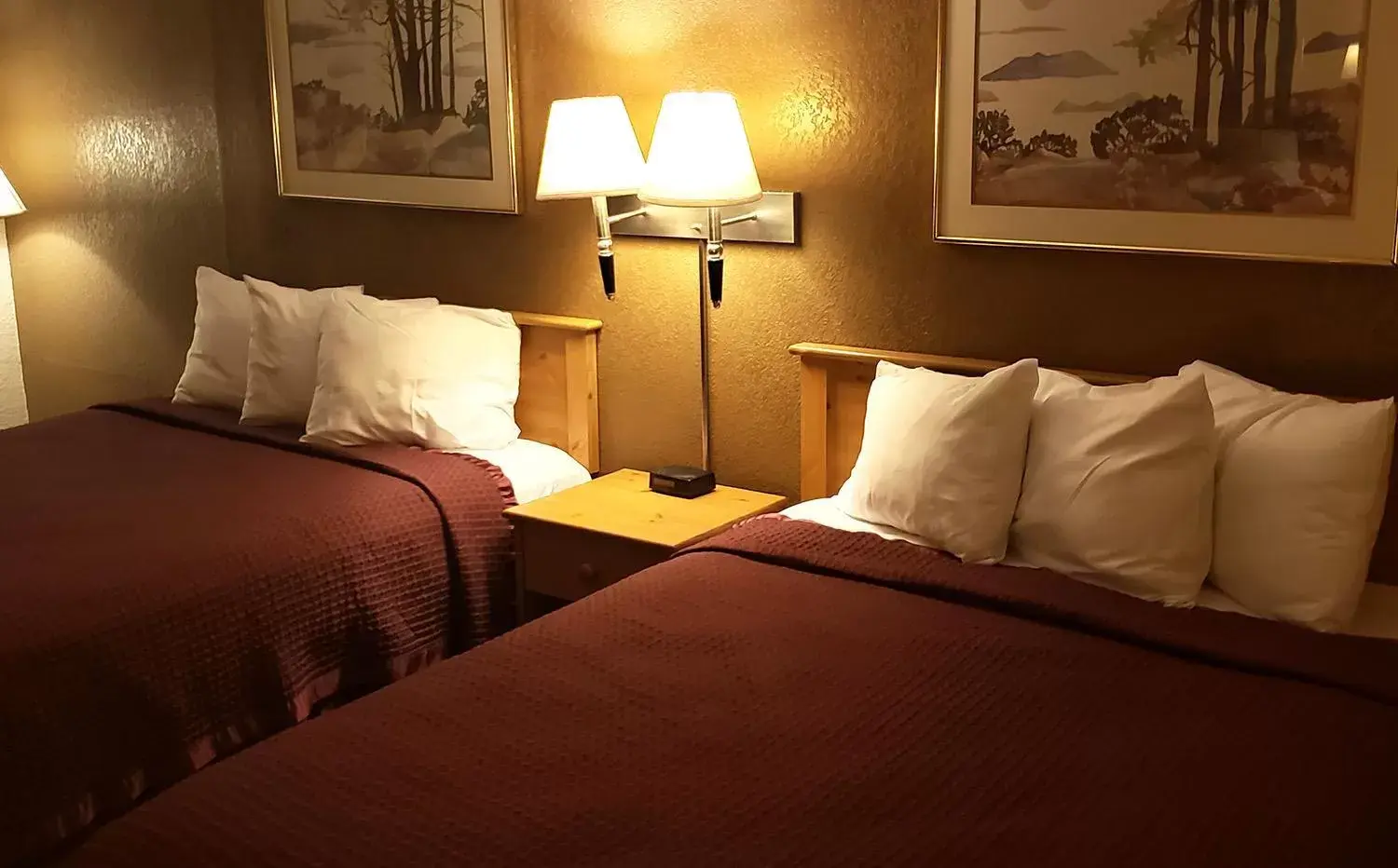 Bed in Coratel Inn & Suites by Jasper Mankato