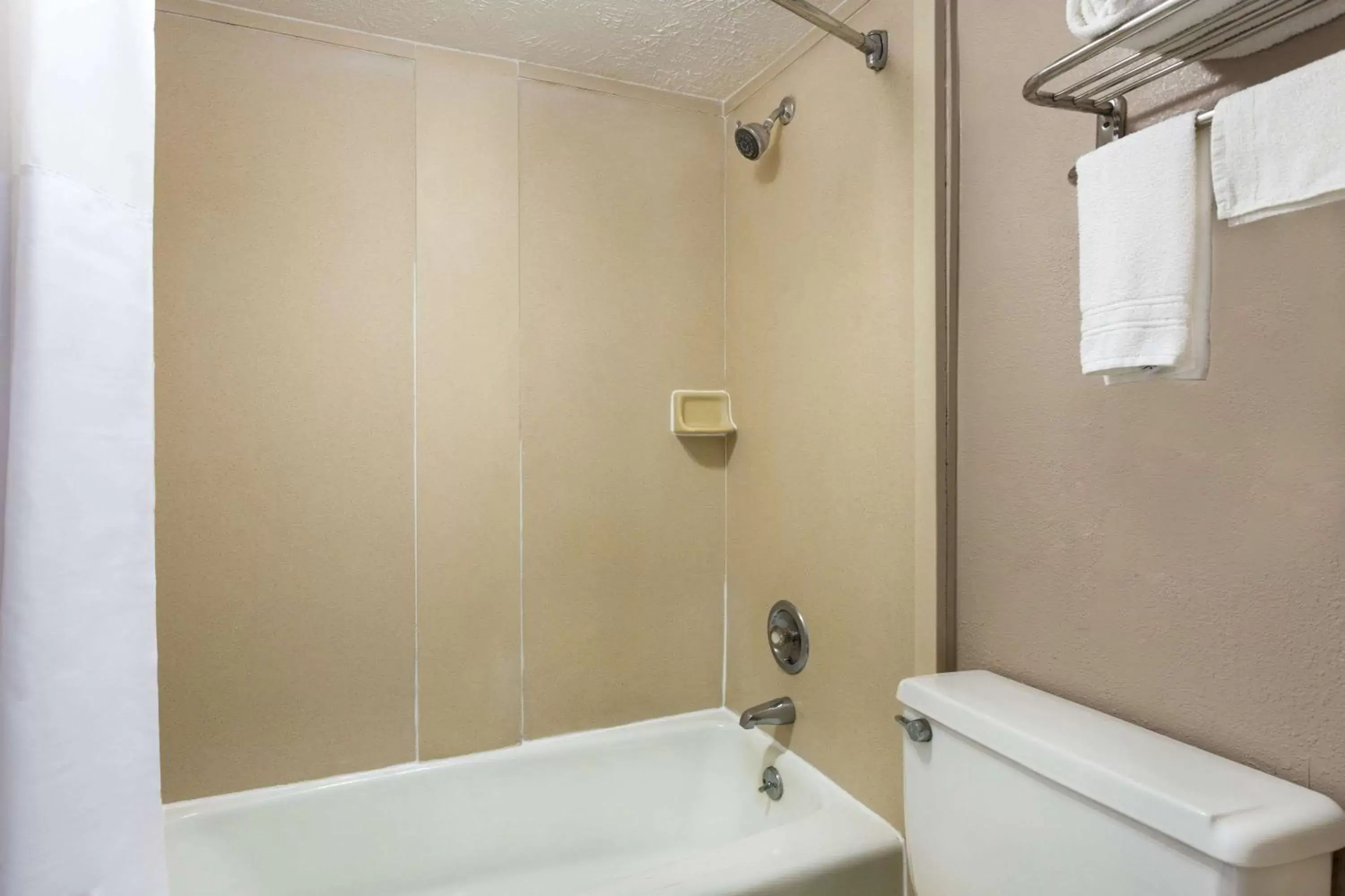 Bathroom in Super 8 by Wyndham Locust Grove