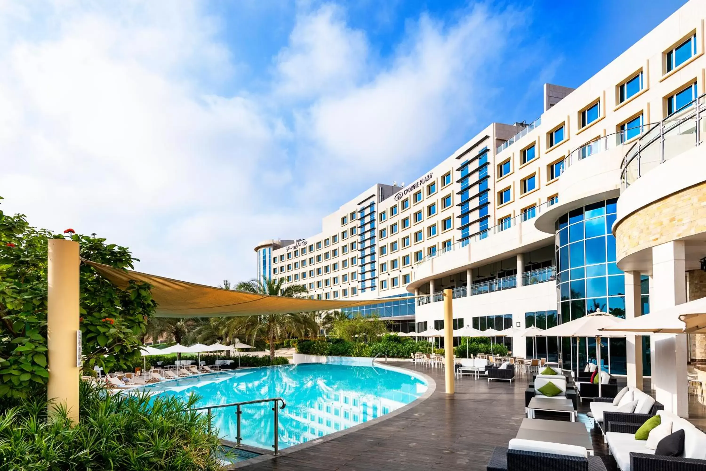 Property building, Swimming Pool in Crowne Plaza Muscat OCEC, an IHG Hotel