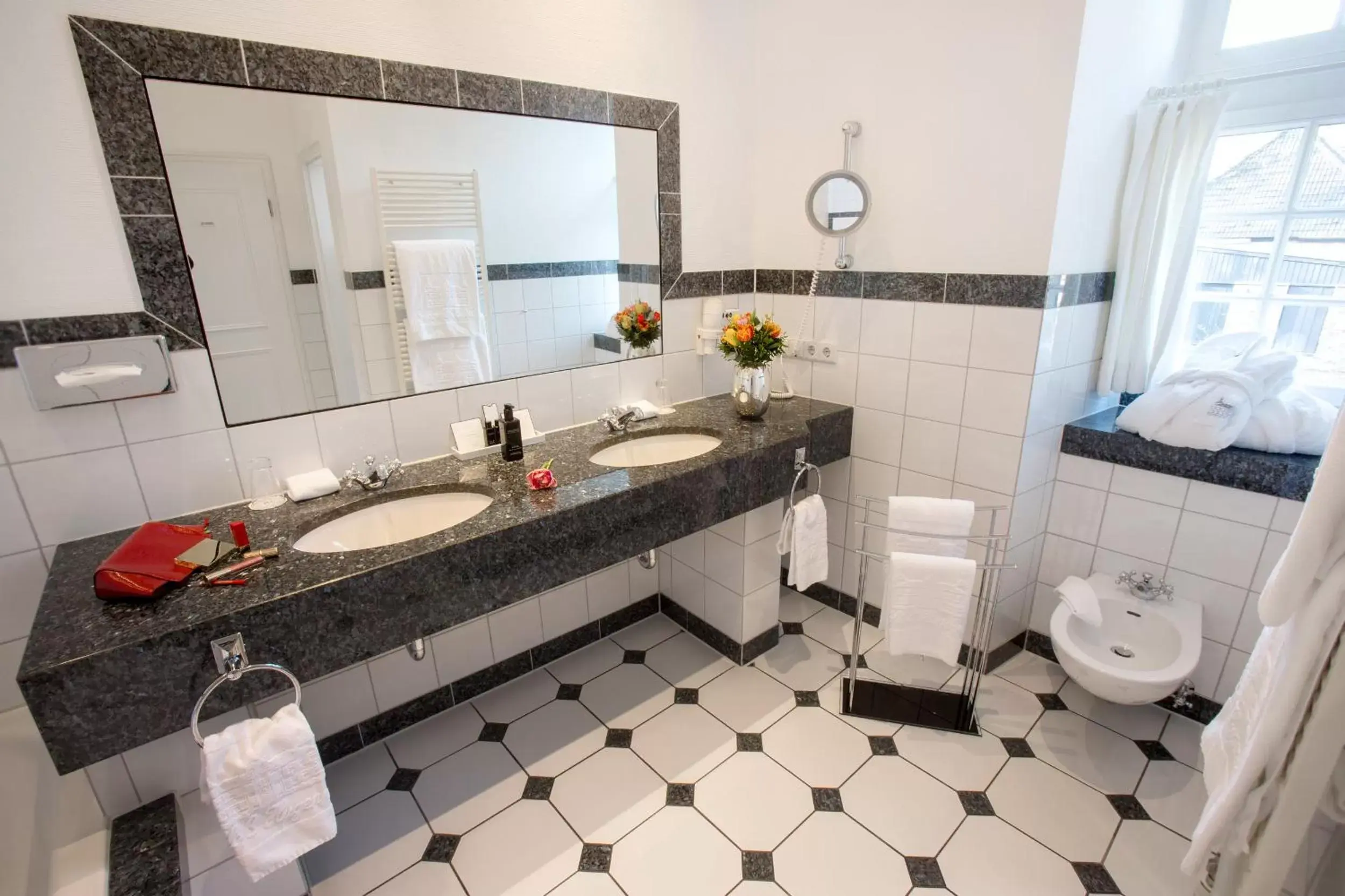 Bathroom in Schlosshotel Hugenpoet