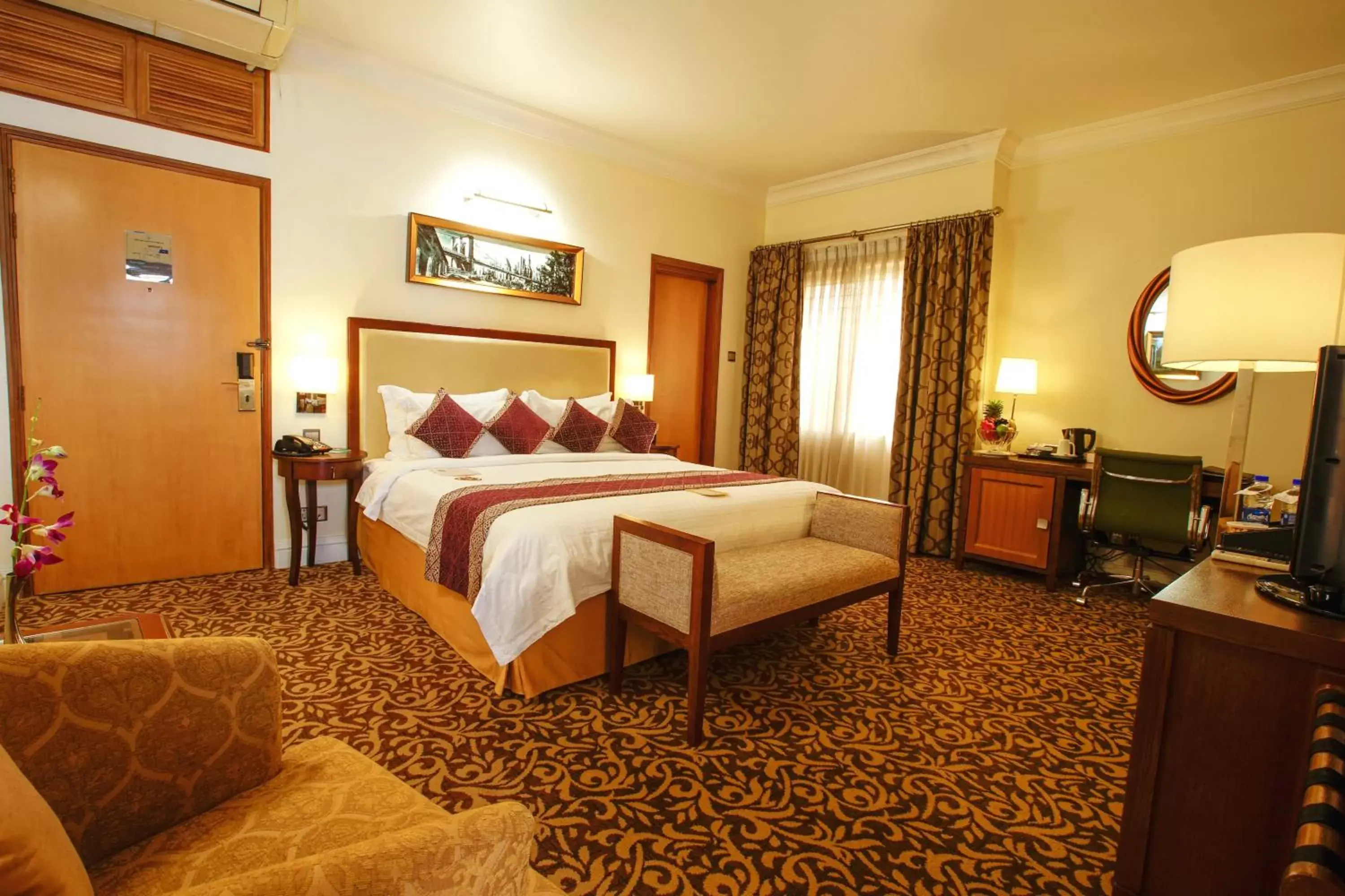 Bed in Royal Park Residence Hotel