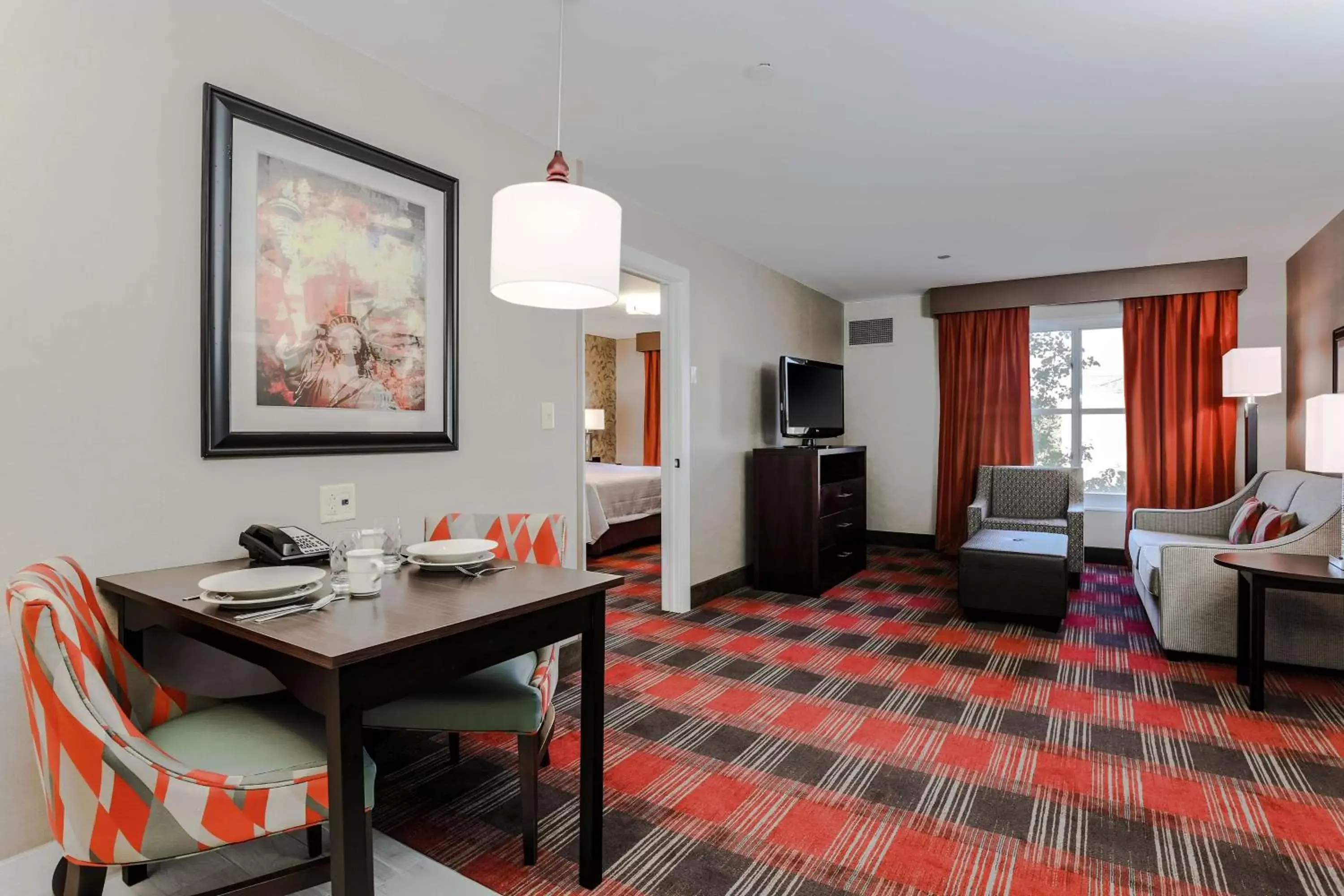 Living room, Dining Area in Homewood Suites by Hilton Long Island-Melville