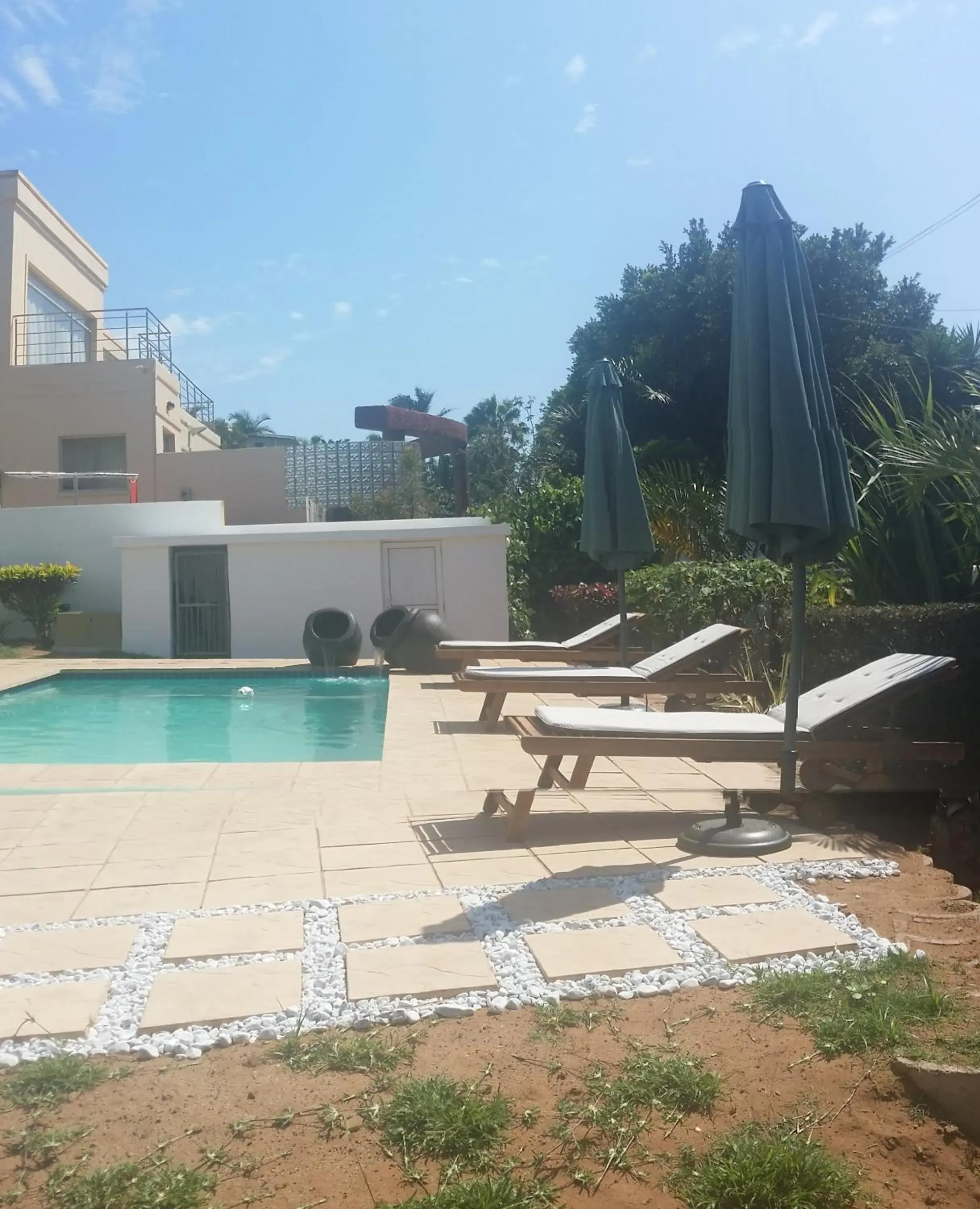 Day, Swimming Pool in 34 on Milkwood Guesthouse