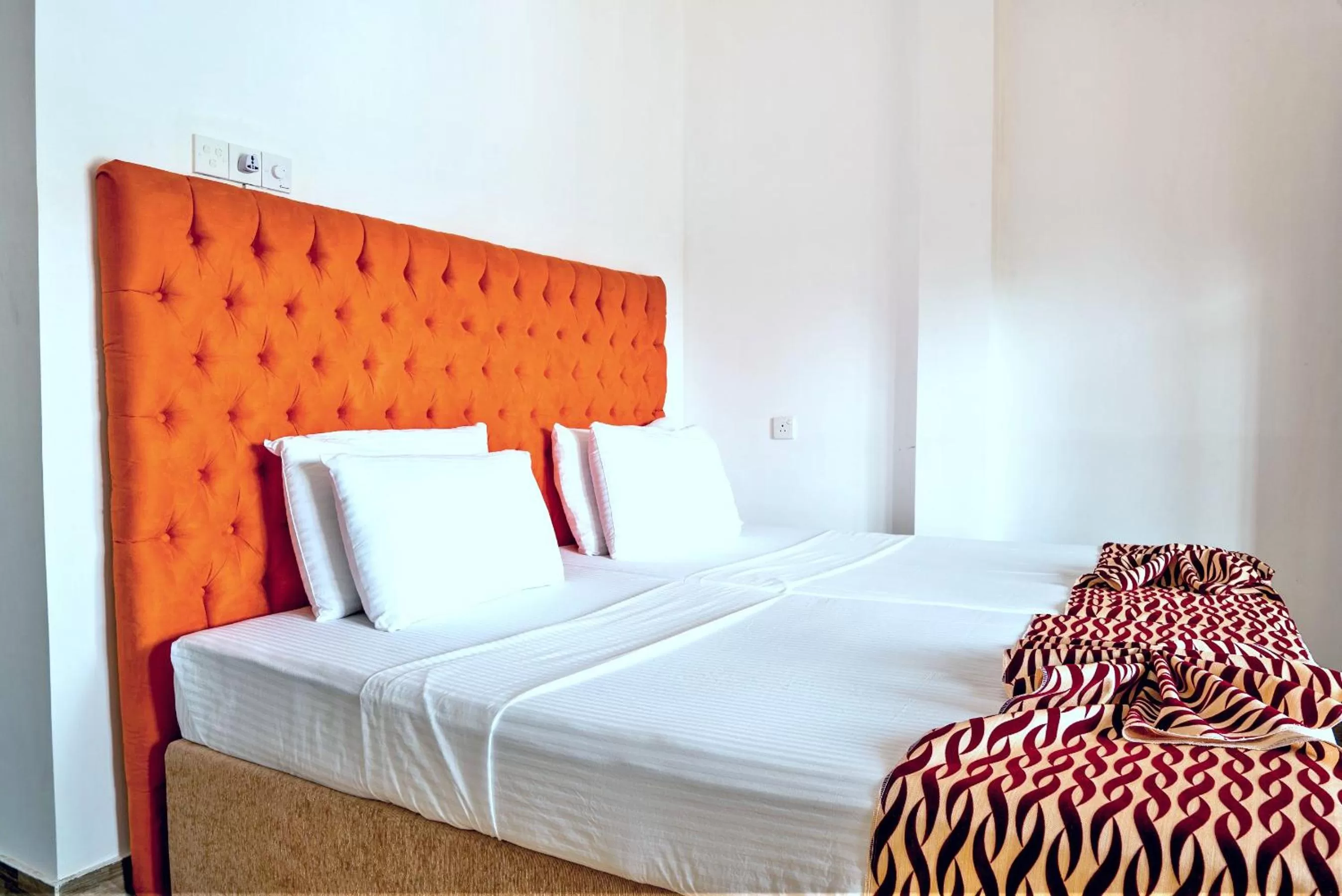 Bed in Ocean Bay Surf Resort Weligama