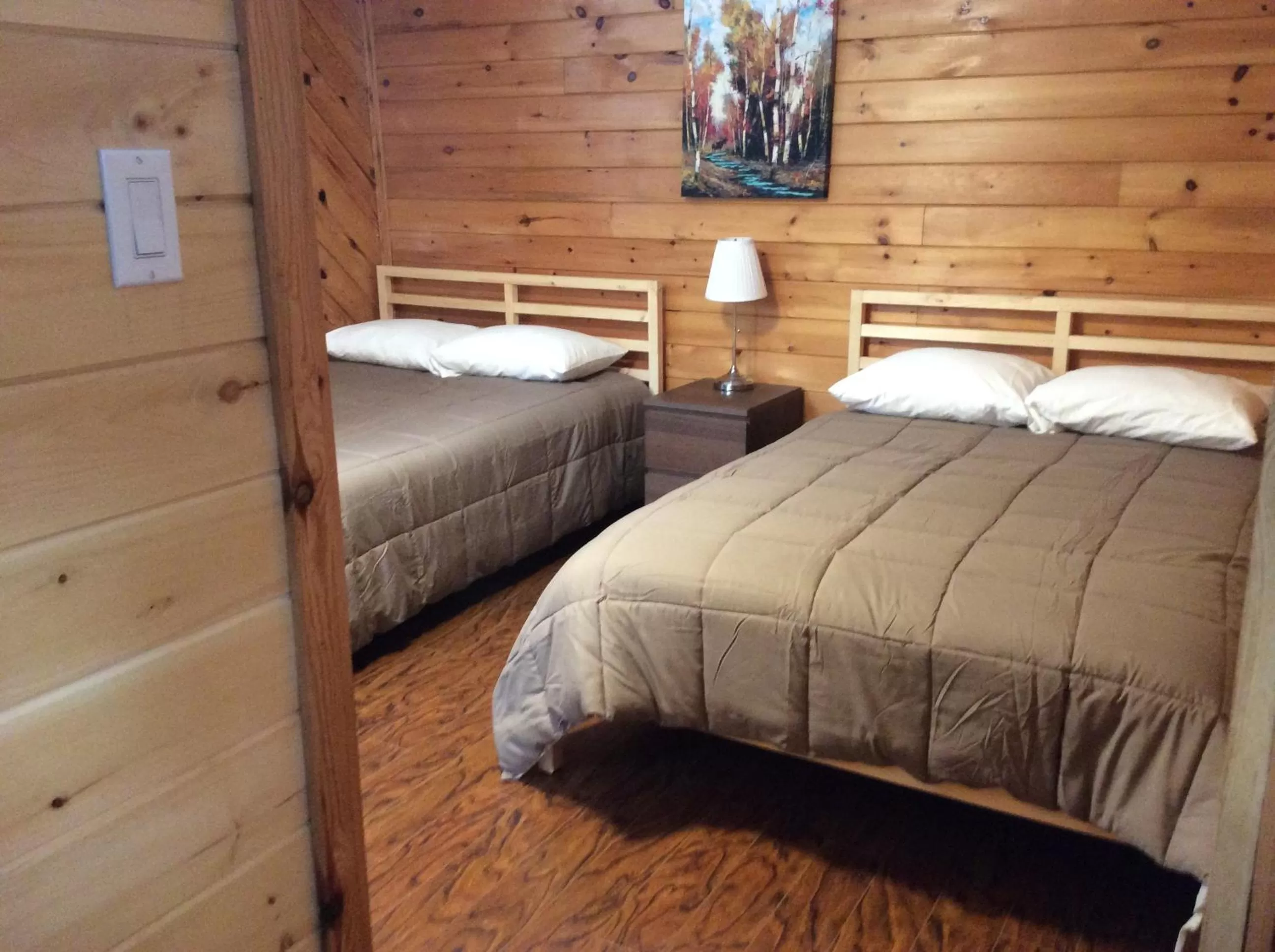 Bed in Madawaska Lodge