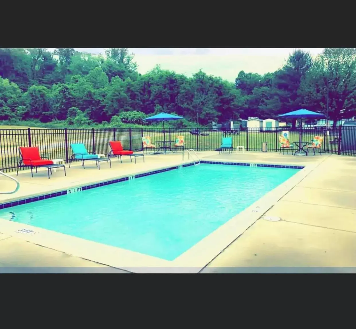 Swimming Pool in Microtel Inn & Suites by Wyndham Cherokee