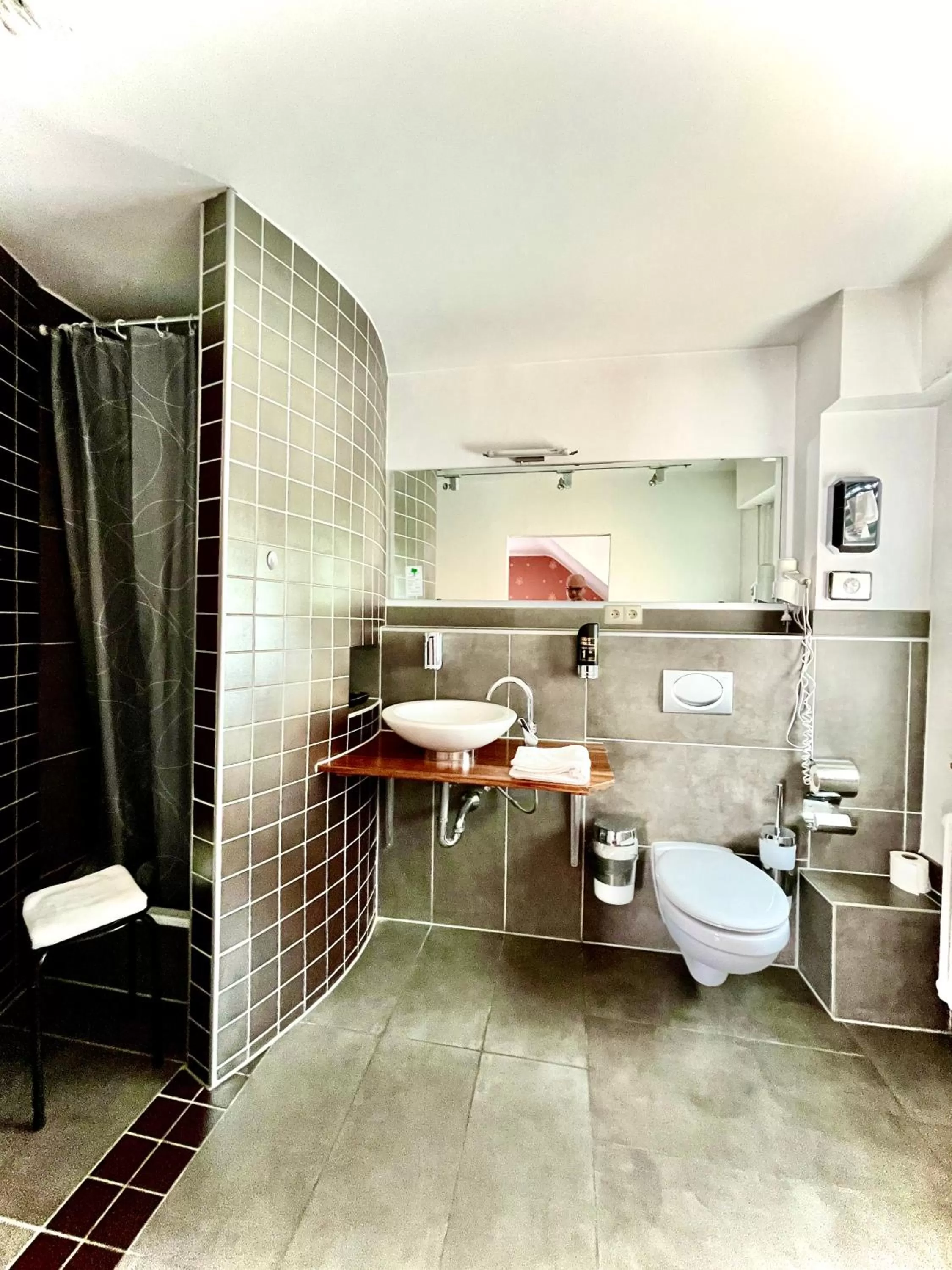 Bathroom in Hafner Hotel- Apartment