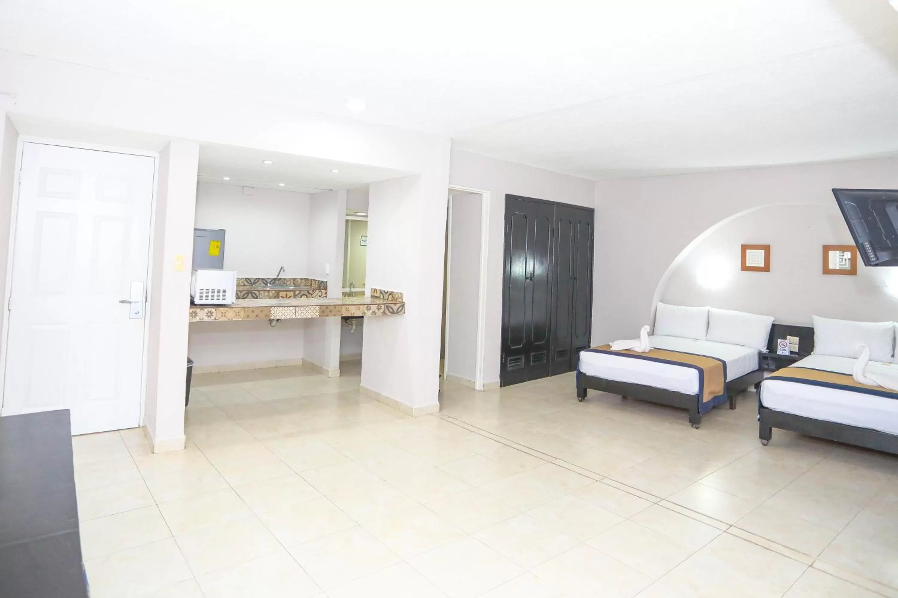 Bed in Hotel Caribe Internacional Cancun