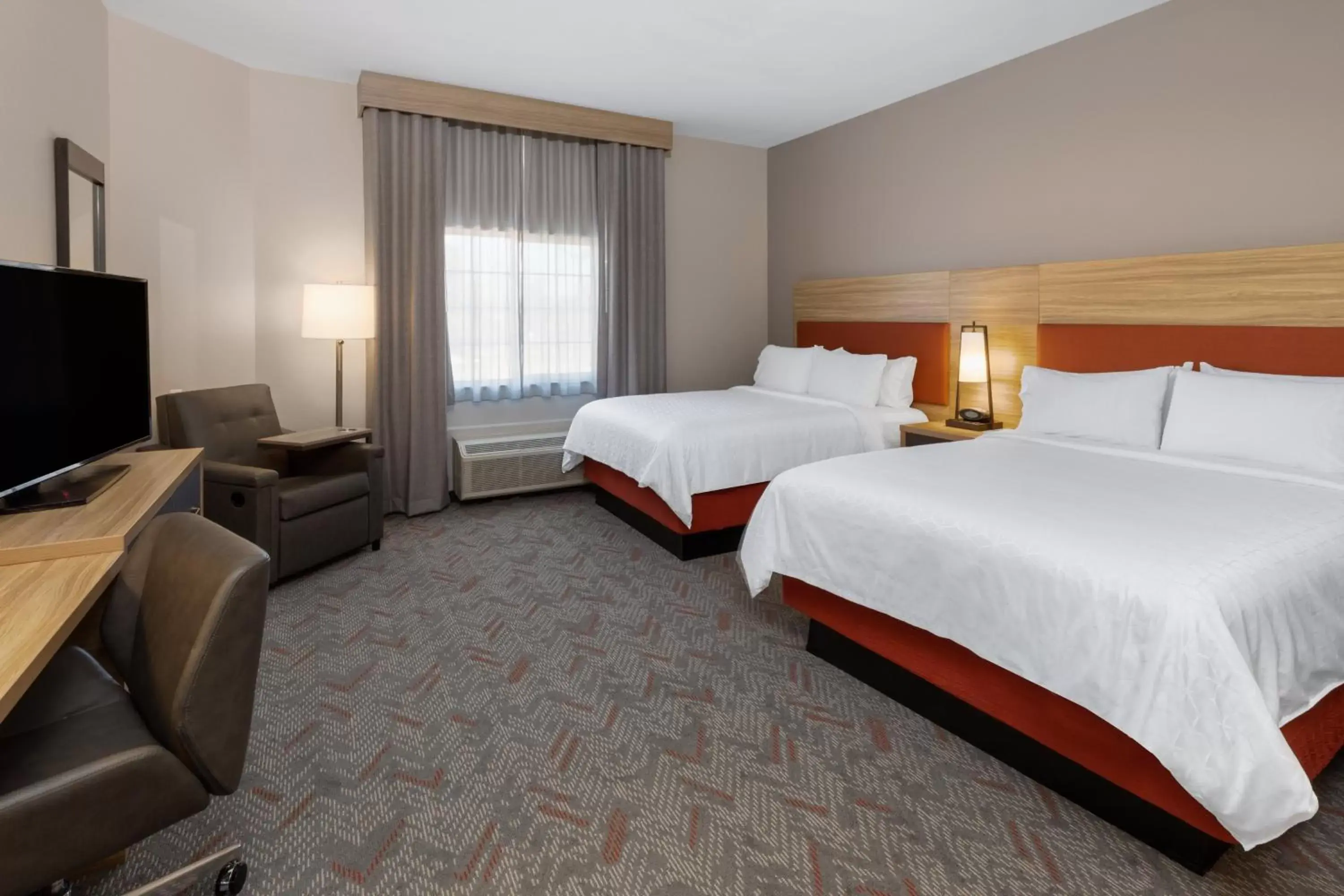 Photo of the whole room, Bed in Candlewood Suites Mount Pleasant, an IHG Hotel