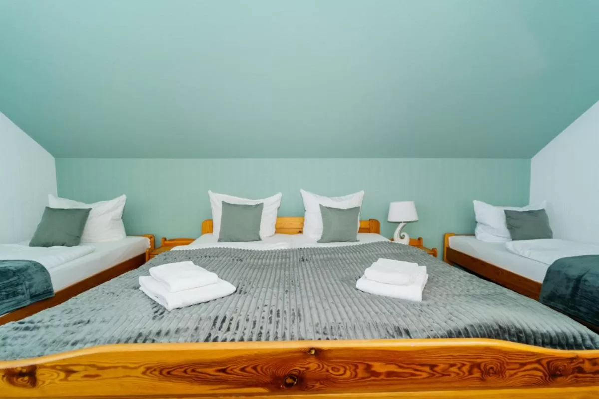 Bed in Bestwaner Hotel