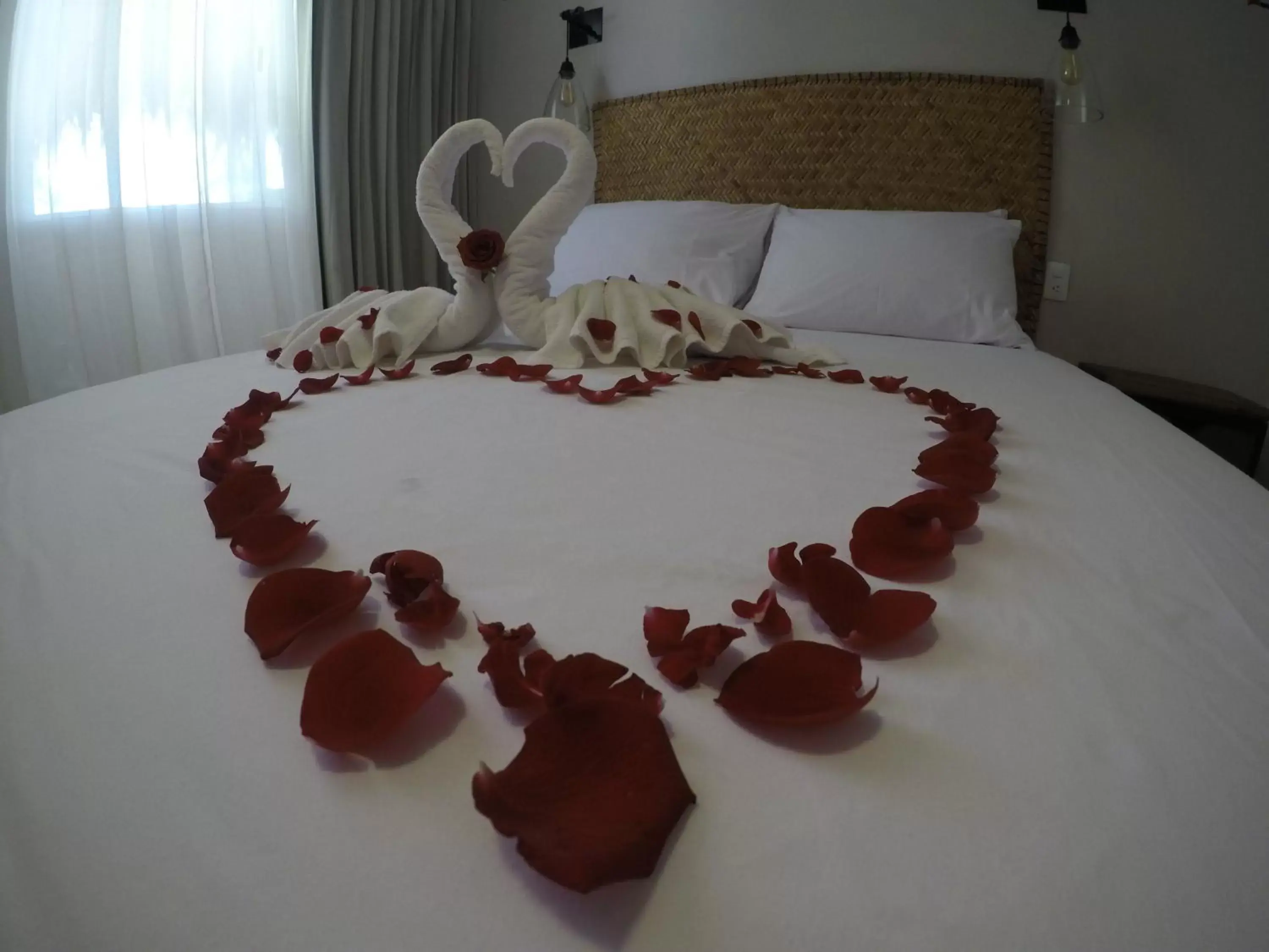 towels, Bed in Agam Hotel