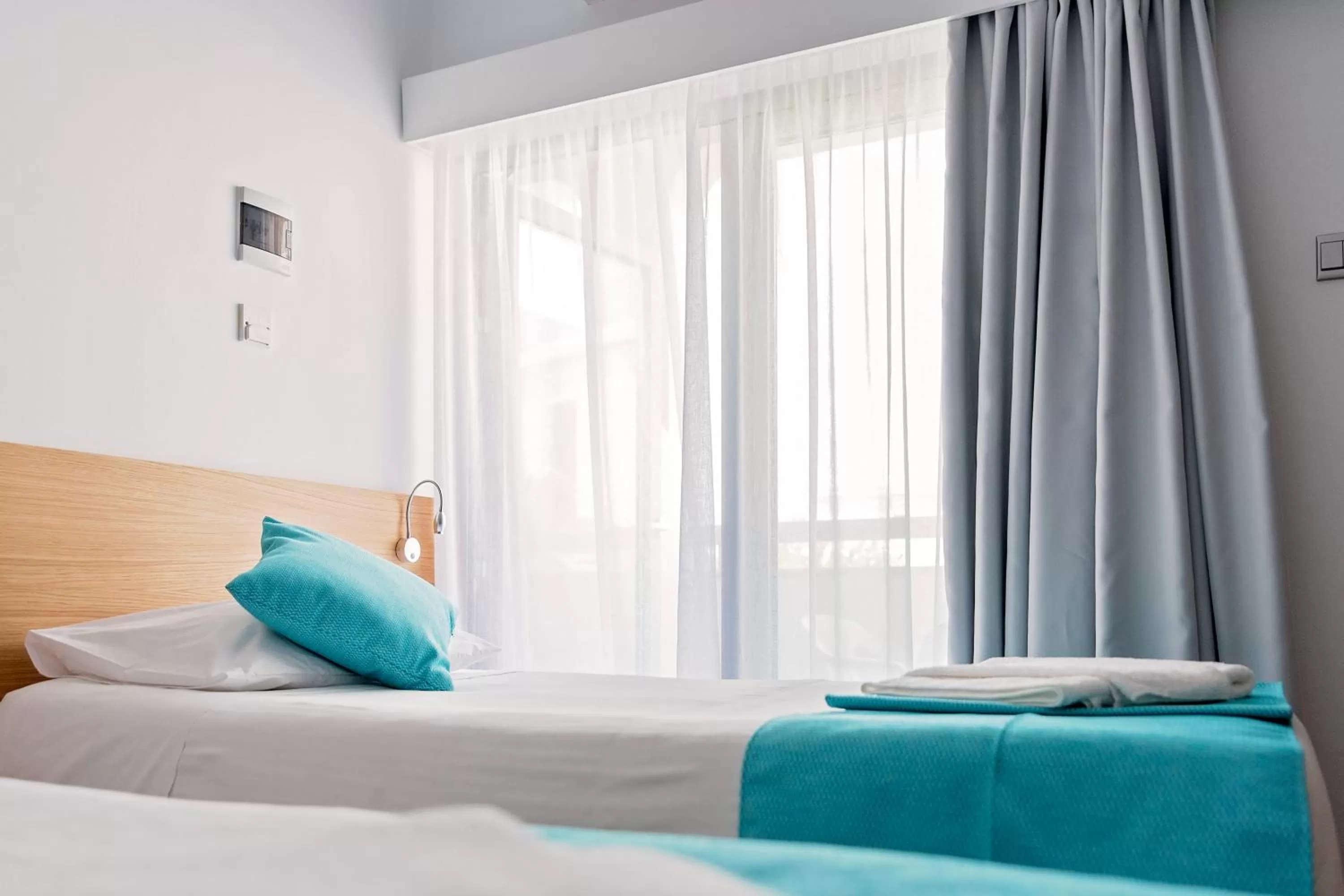 Bed in Pyramos Hotel