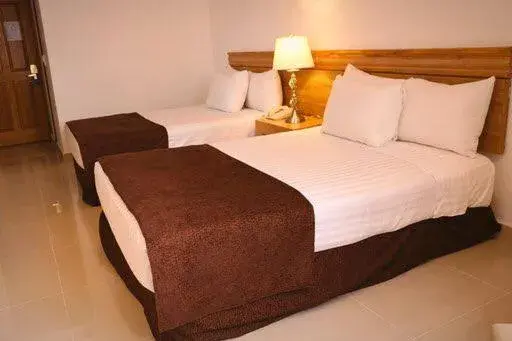 Bed in Hotel Laffayette Ejecutivo