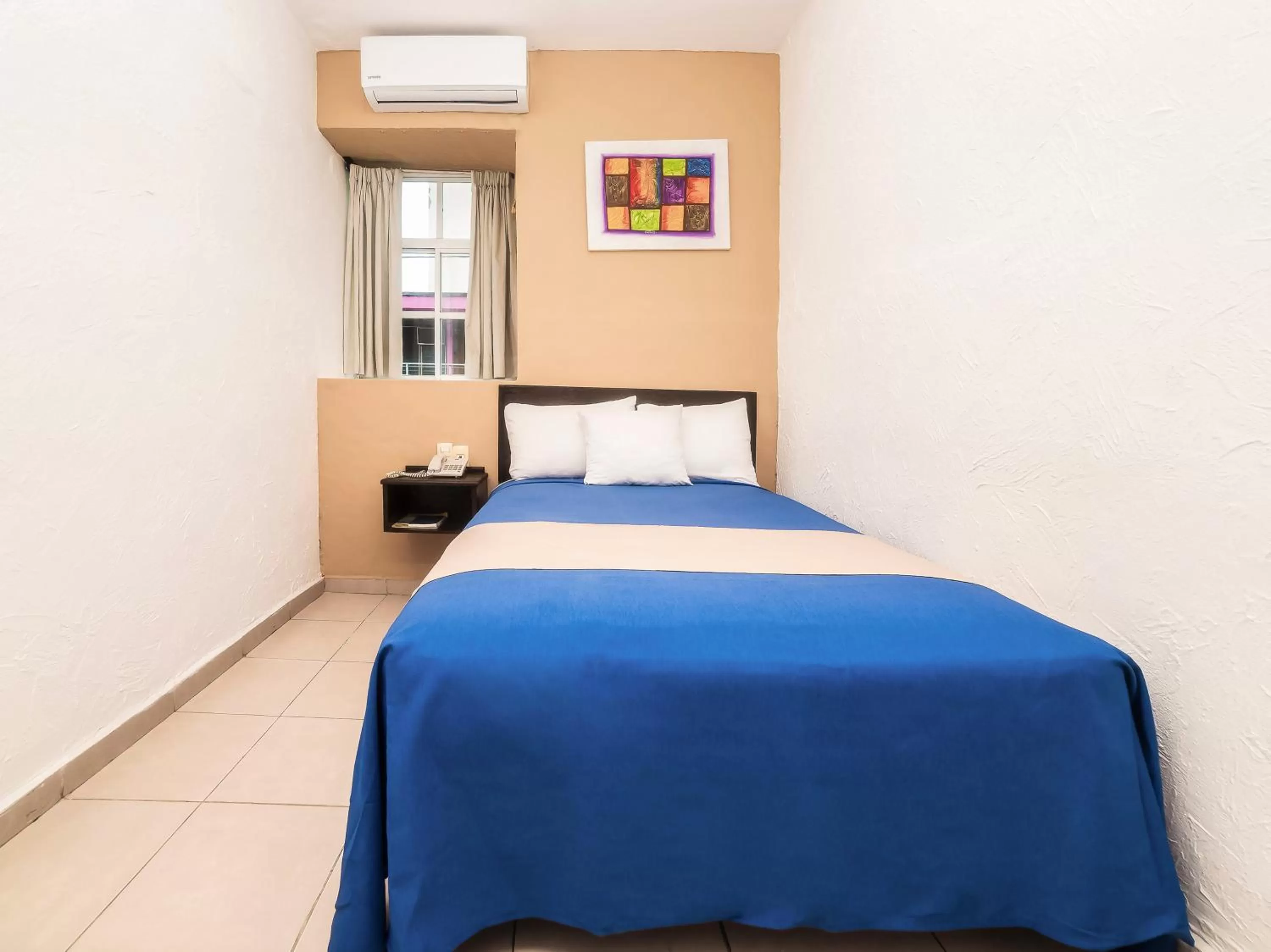 Bed in Hotel Trianon