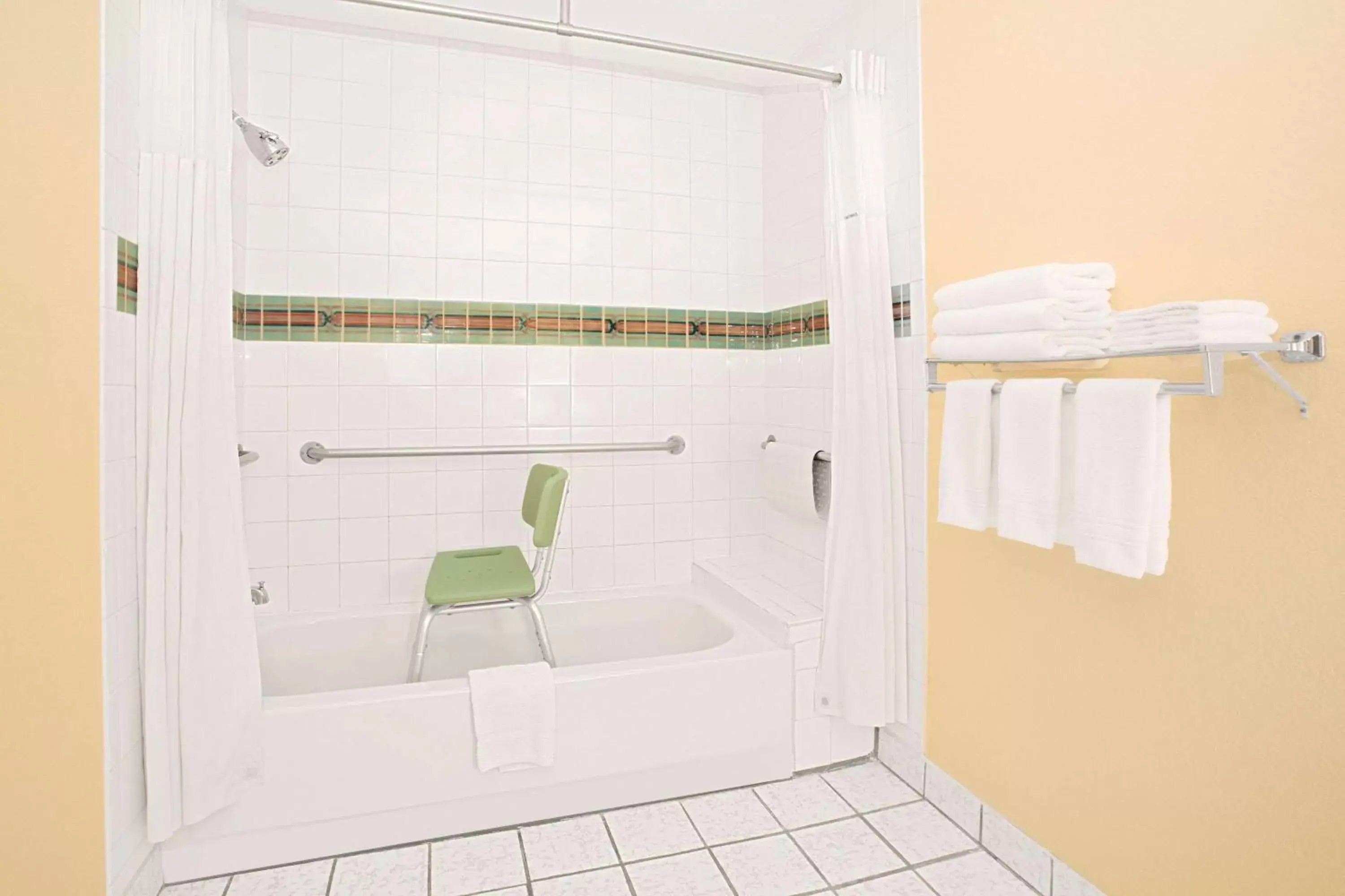 Bathroom in Days Inn & Suites by Wyndham Red Rock-Gallup