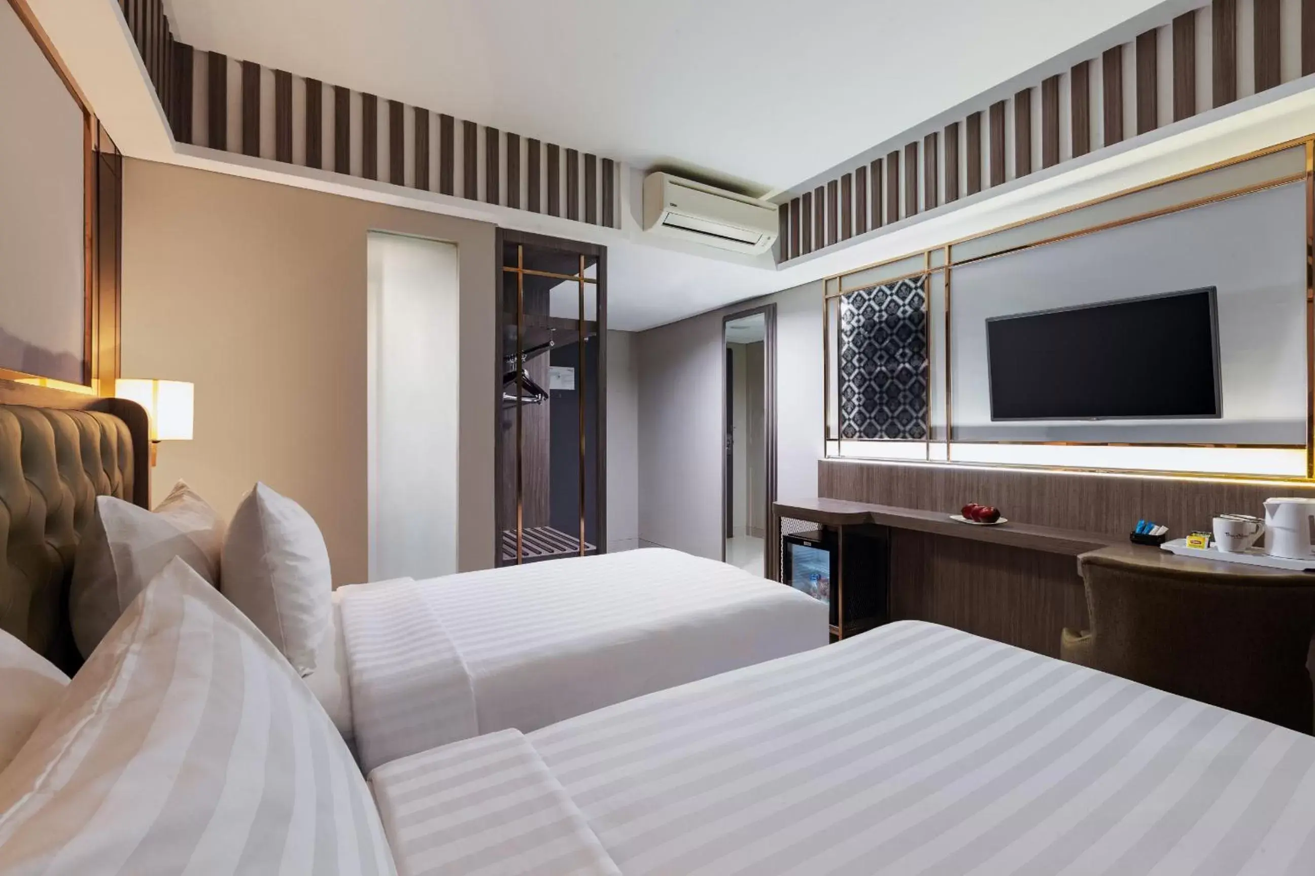 Bedroom, Bed in The Alana Hotel & Conference Center Malioboro Yogyakarta by ASTON