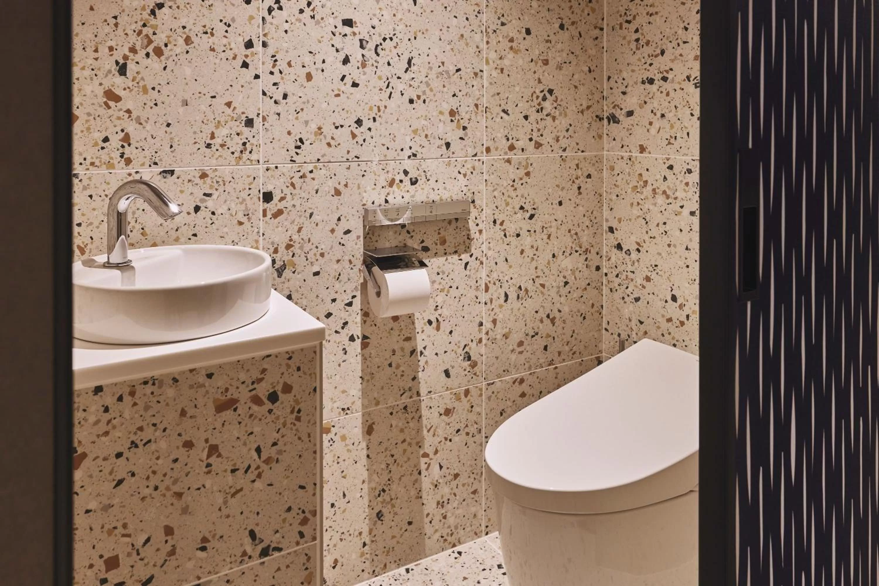 Bathroom in voco Osaka Central by IHG