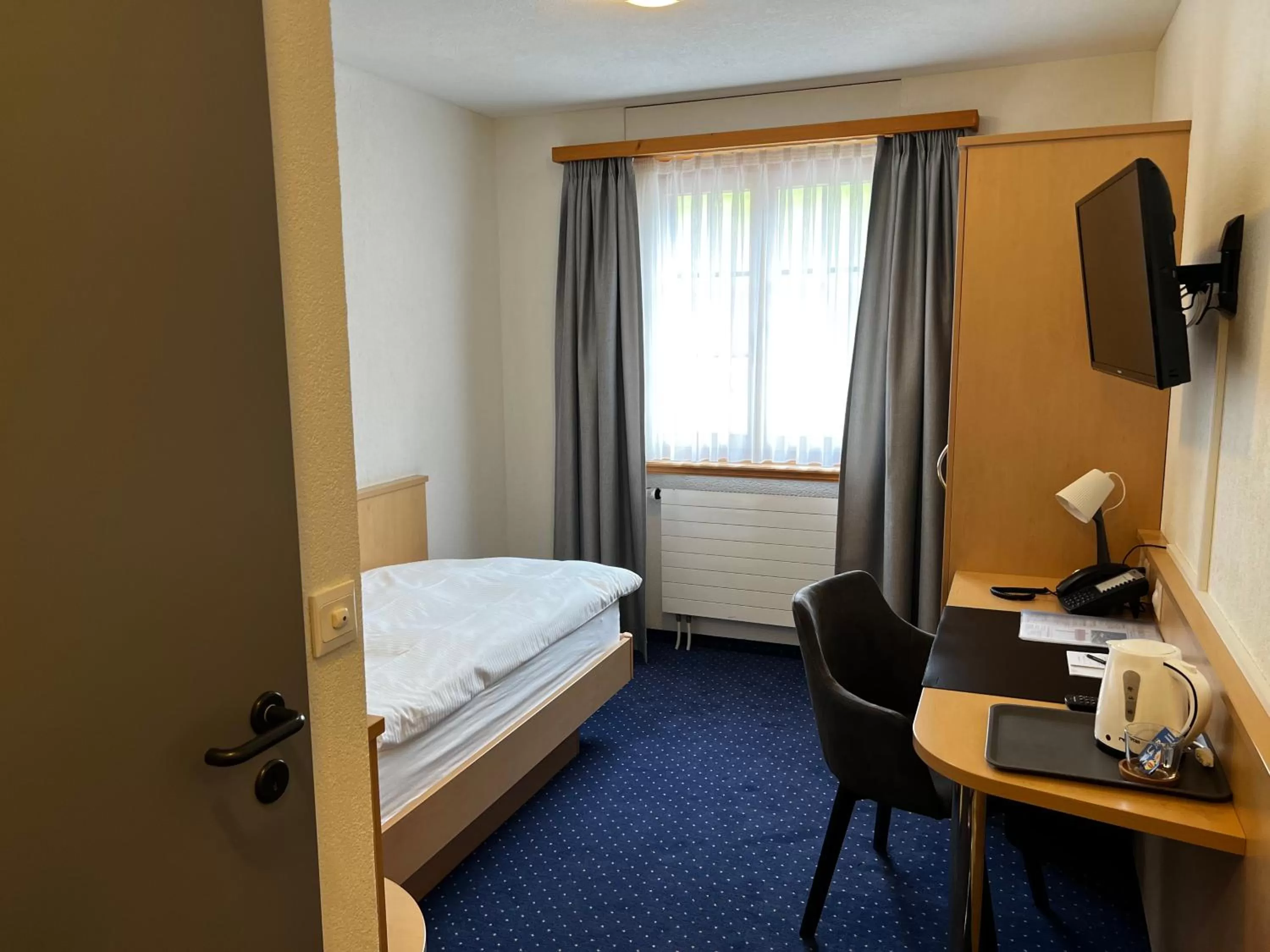 Bed in Hotel Bünda Davos