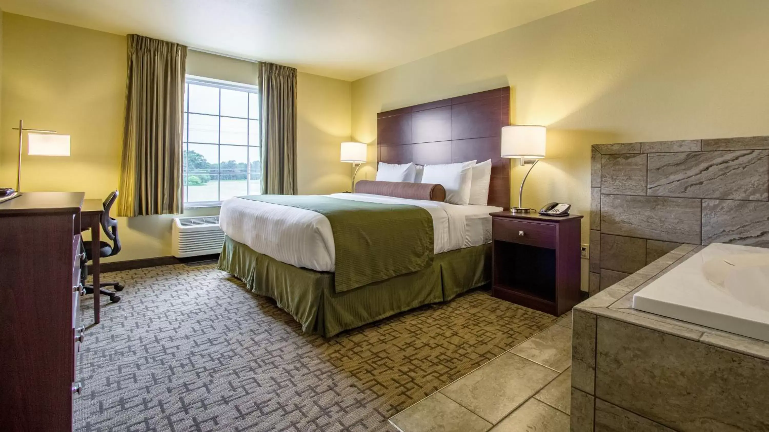 Bed in Cobblestone Hotel & Suites - Orrville Bed in Cobblestone Hotel & Suites - Orrville