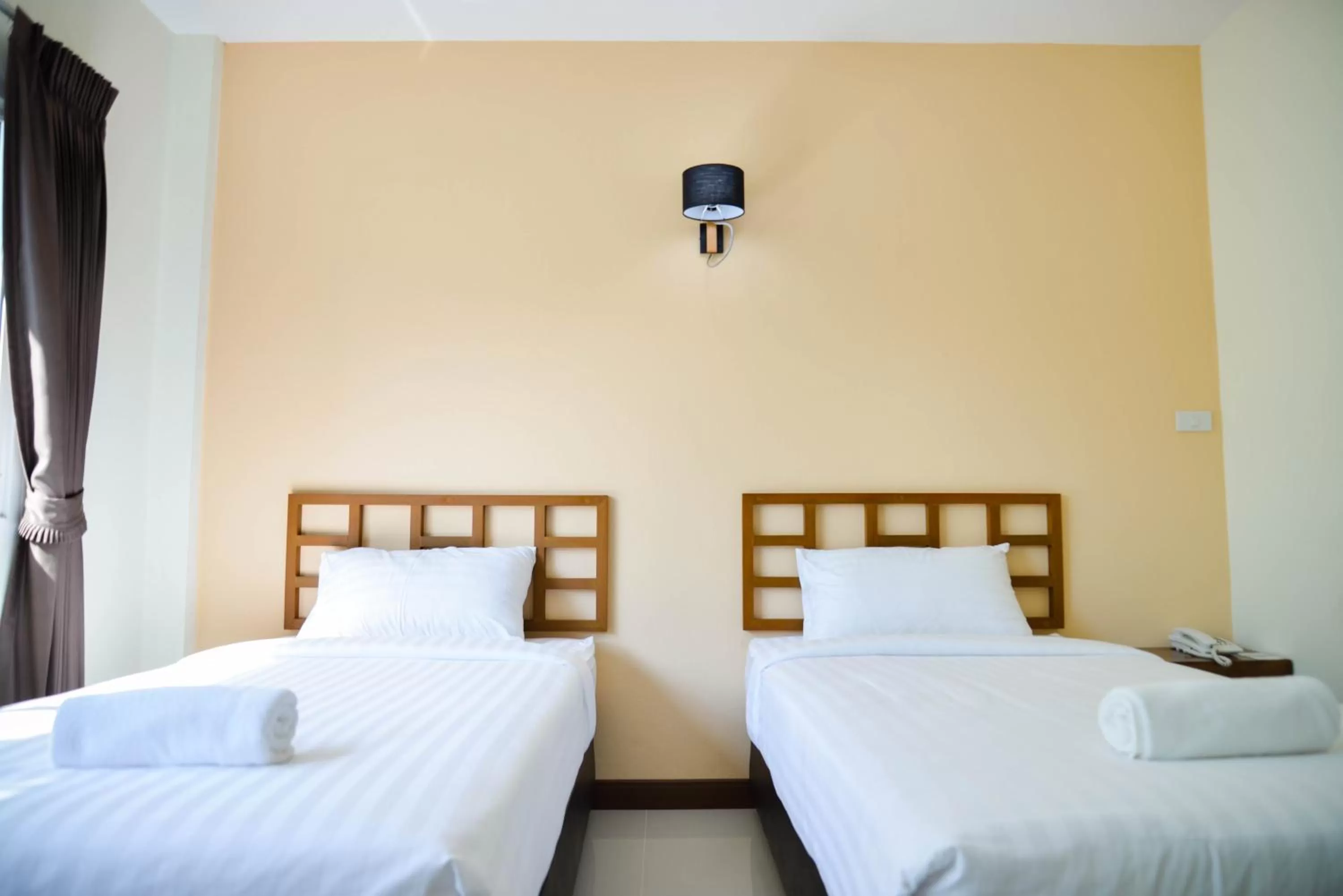 Bed in Thaimit Resort