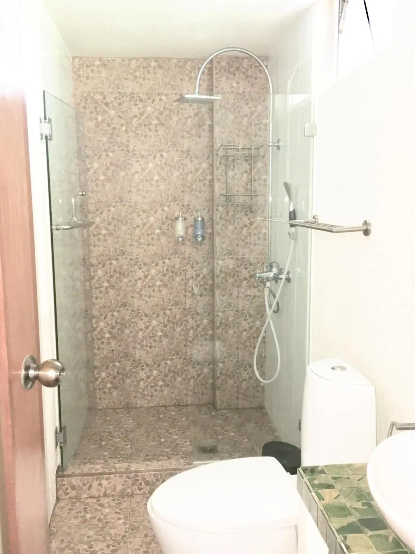 Shower, Bathroom in Sunset At Aninuan Beach Resort