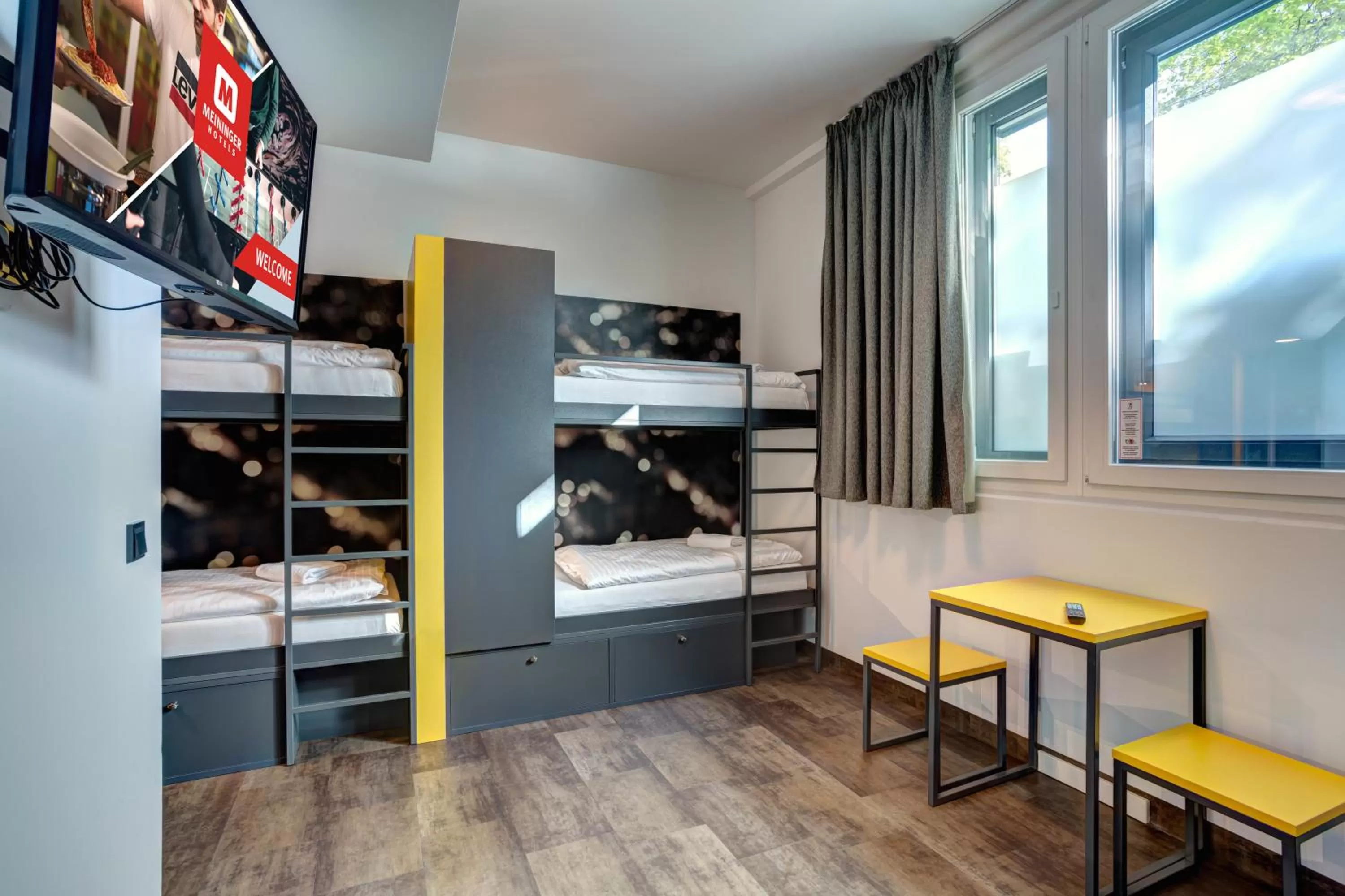 Photo of the whole room, Bed in MEININGER Hotel München Olympiapark